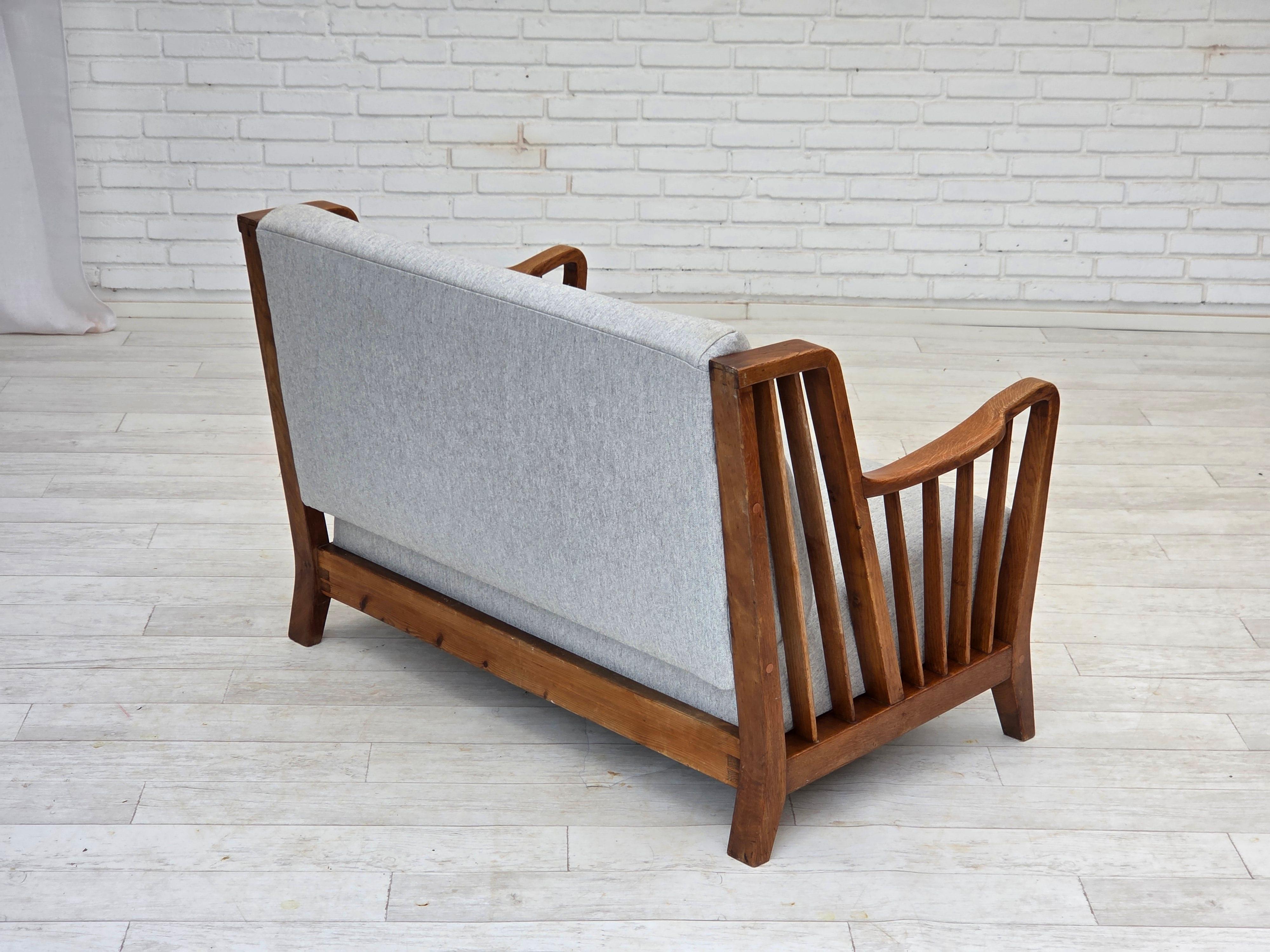 1950s, Scandinavian 2-seater sofa, reupholstered, furniture wool, oak. For Sale 2