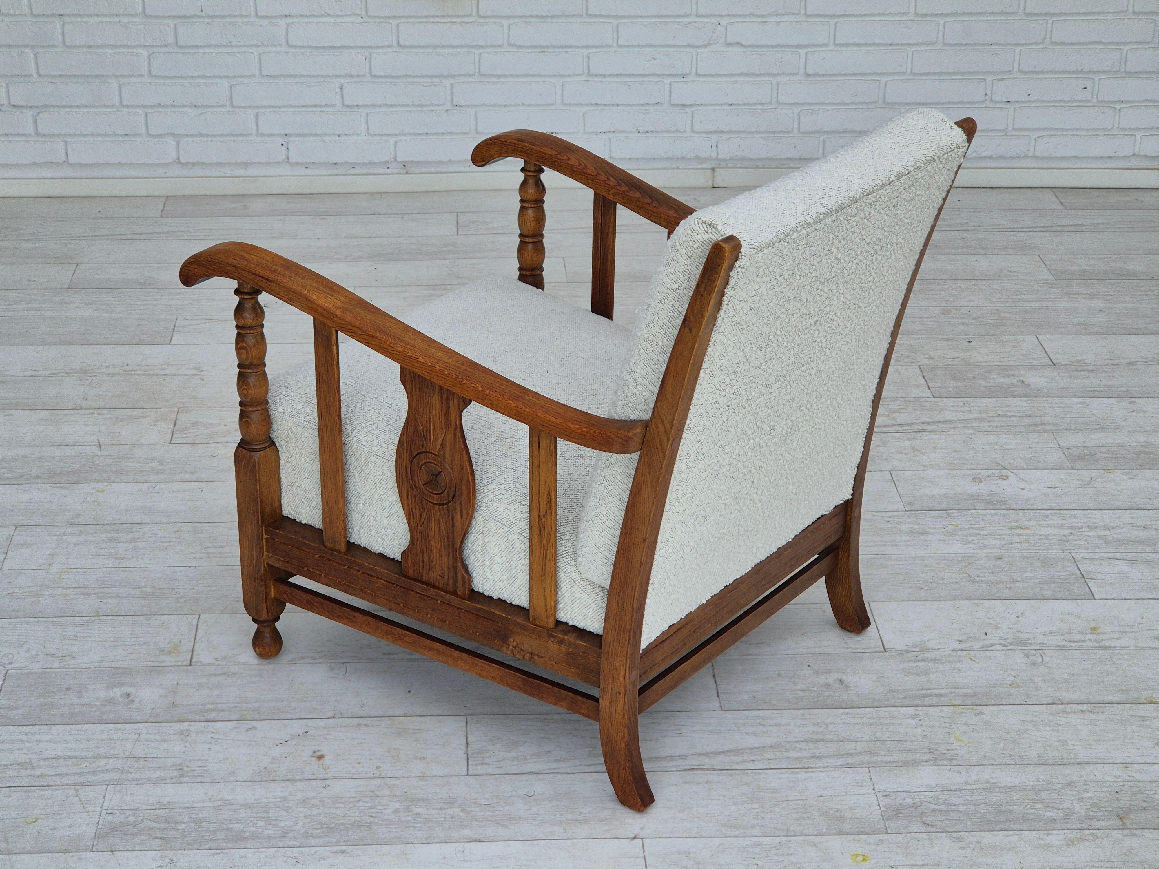 Mid-20th Century 1950s, Scandinavian design, reupholstered armchair, fabric, oak wood. For Sale