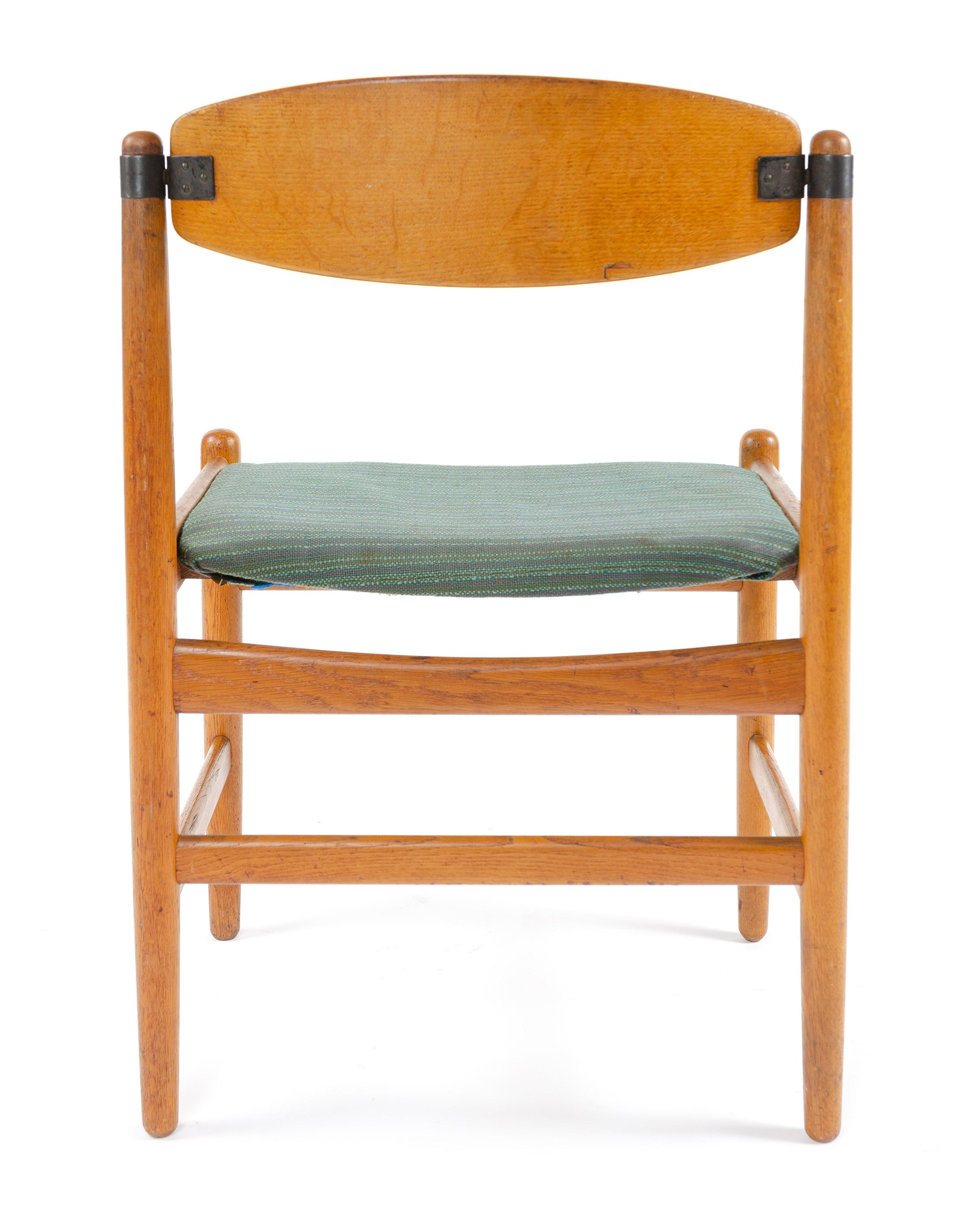 European 1950s Scandinavian Modern Pivot Back Oak Dining Chairs For Sale