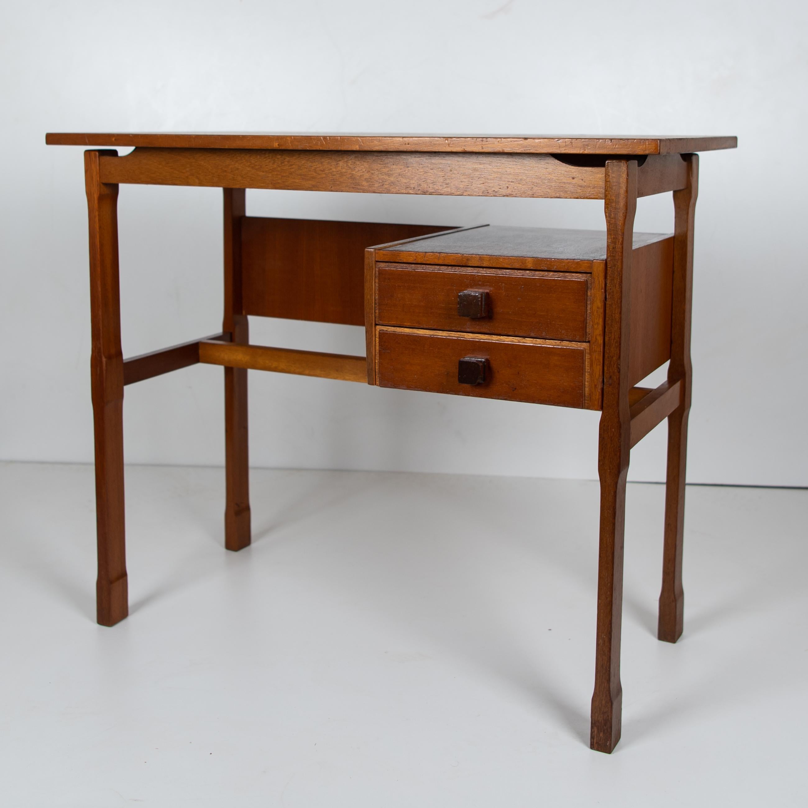 Vintage desk.
Cozy 1950s vintage desk table in scandinavian style with two wood drawers on the side. Ideal for small spaces. The item has been renovated and major damages have been repaired. Drawers's pommels are also in solid wood.