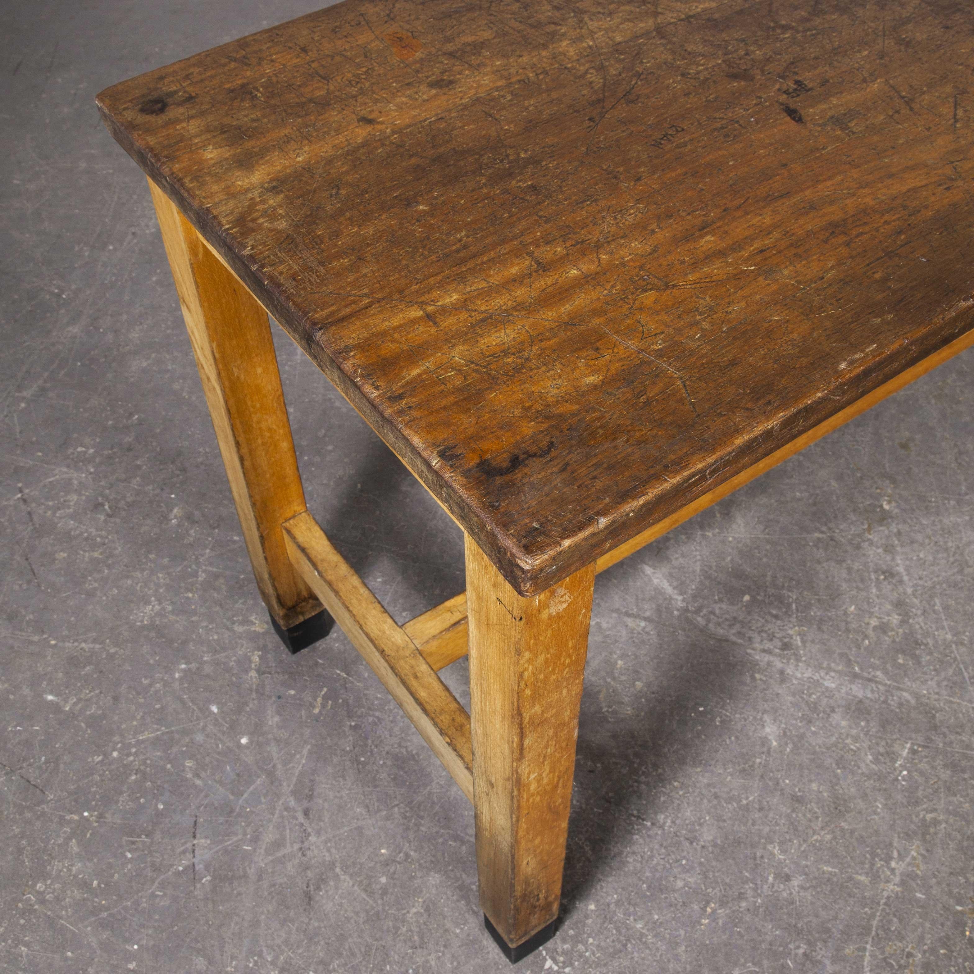 1950s school laboratory rectangular dining table - solid Iroko top

1950s school laboratory rectangular dining table - solid Iroko top. A good practical size with a beech frame base, legs tipped with black and a brilliant heavily used solid iroko
