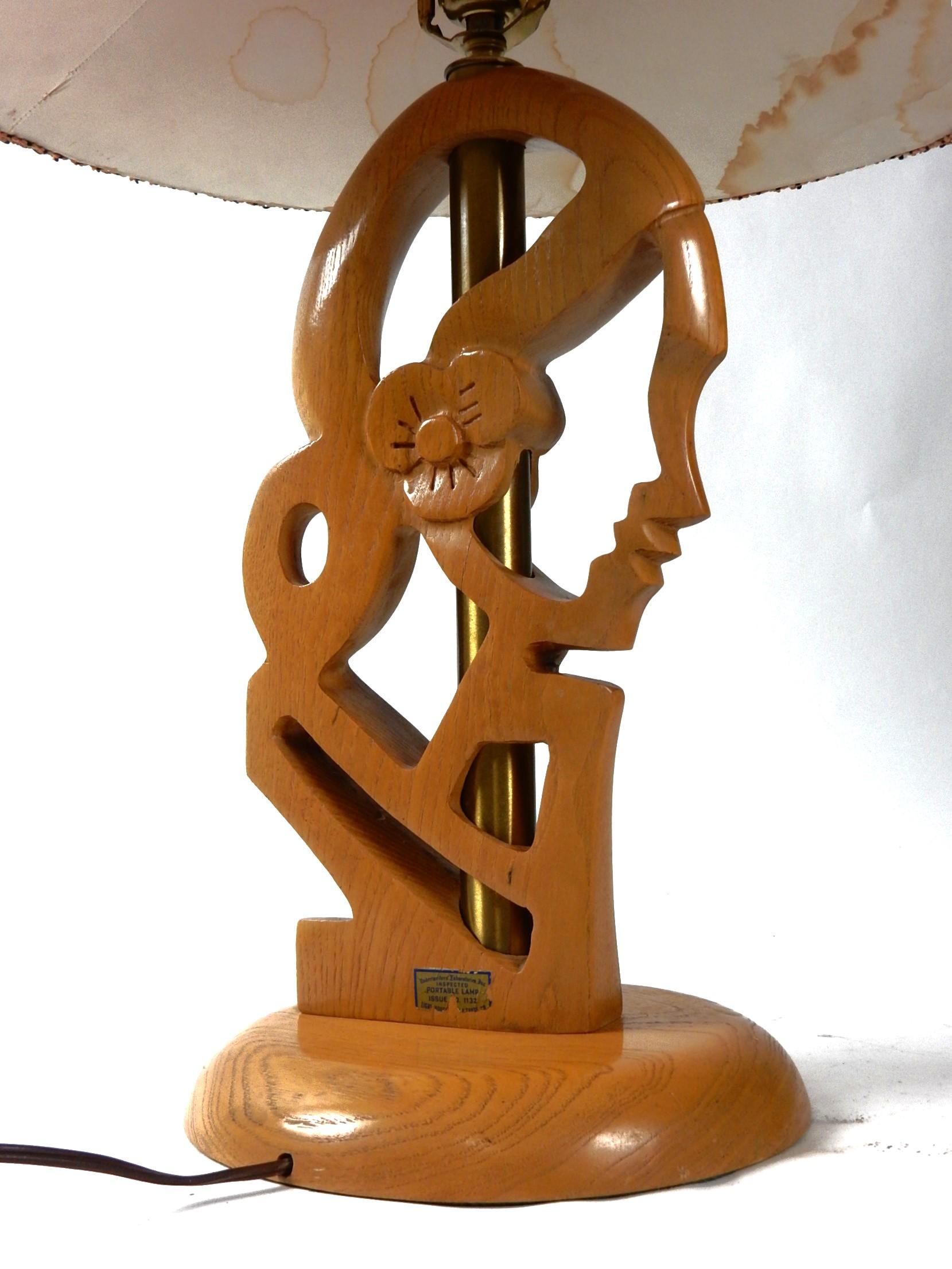 Mid Century era sculpted oak feminine profile table lamp with it's original 