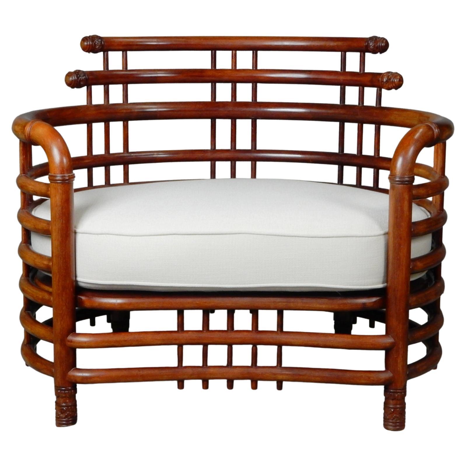 Exceptional pair of 1950's birdcage lounge chairs crafted of Burmese Teak.
These are big lounge chairs. Very heavy, solid and well crafted each weighing 65lbs.
No damage or repairs to frames. Newly upholstered cushions. 
Not marked by designer or