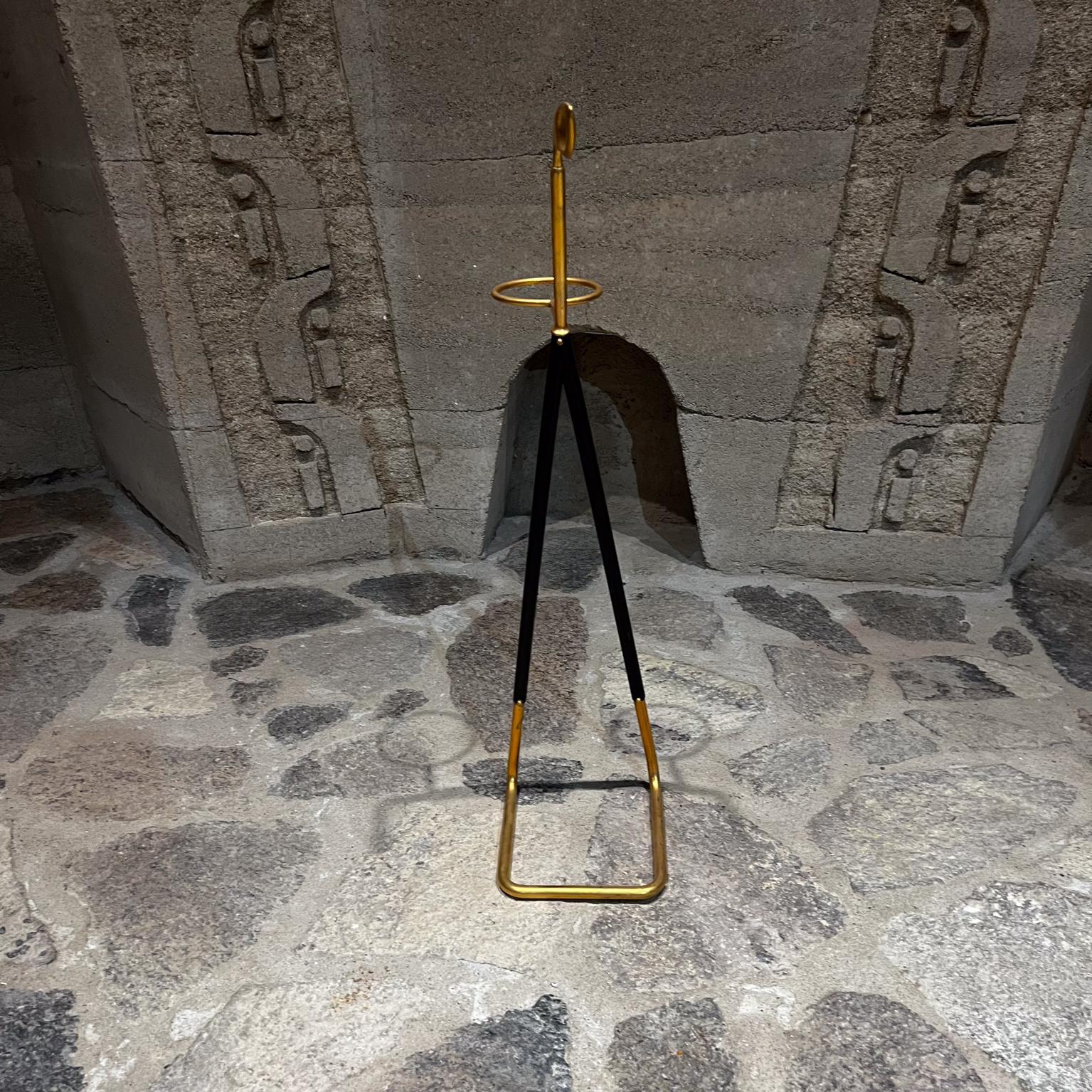 Fabulous Umbrella Stand made in ITALY 1950s
Sculpturally crafted in polished brass and black metal.
Style of Cesare Lacca & Ico Parisi
Original unrestored like new vintage condition.
 28 h x 7.25 d x 6.5 w
Refer to images.