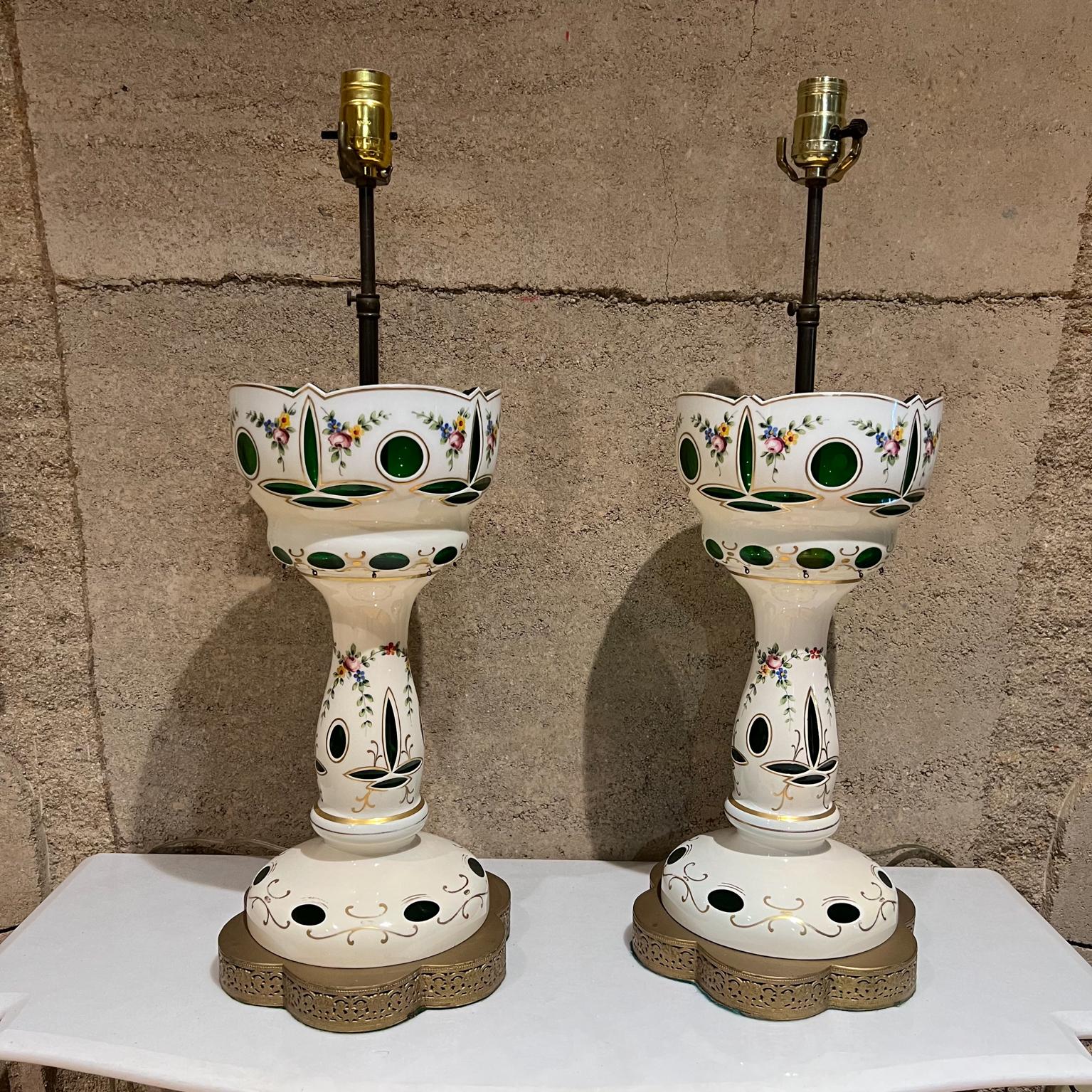 1950s Sculptural pair table lamps white gold and green glass floral hand paint
Vintage Bohemian Czech case glass
Measures: 24 tall to socket x 8 diameter 35 to top of finial
Preowned original vintage condition unrestored. No shades