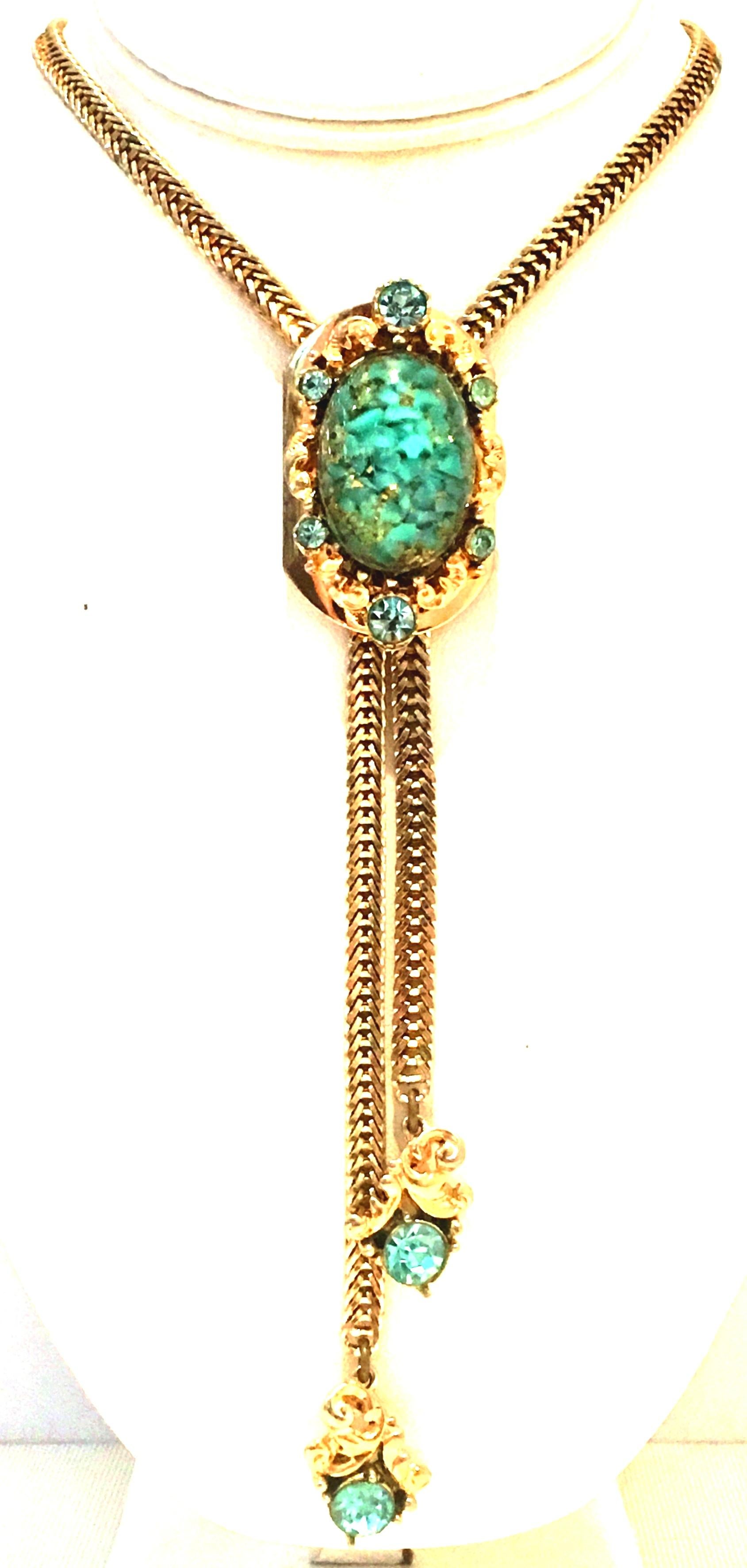 1950'S Gold Plate, Lucite 22K Gold Fleck & Austrian Crystal  Adjustable Bolo Style Necklace Attributed to Selro. Features a central aqua oval polished cabochon cased Lucite with 22-K Gold Fleck detail stone, aqua marine cut and faceted Austrian