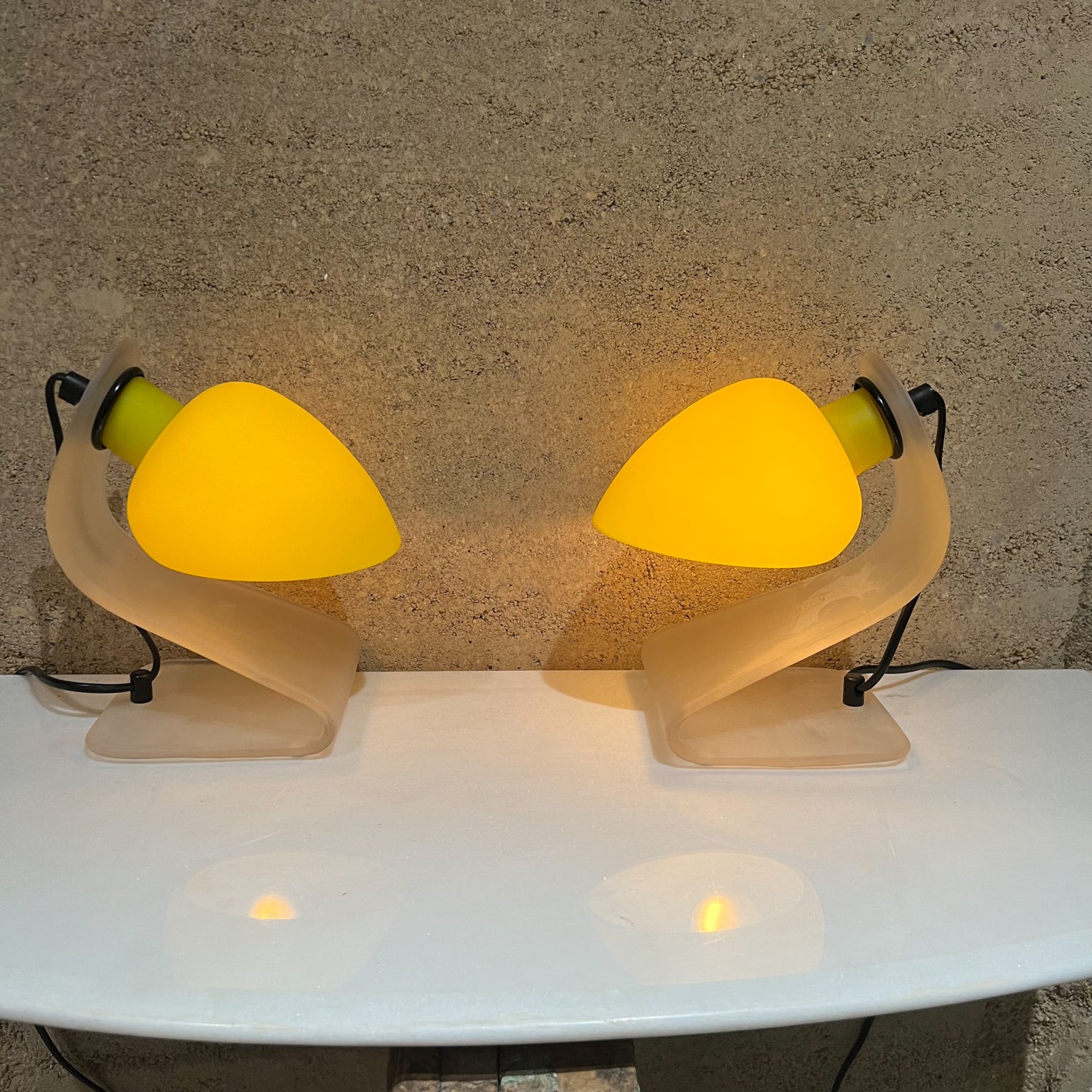 Pair of Italian glass table lamps modern clean design.
Frosted glass base contrasts with yellow shade.
Measures: 8.5 tall x 5.13 W x 7.38 D.
Unmarked Italy 1950s.
Tested and working. Preowned original vintage condition.
See images