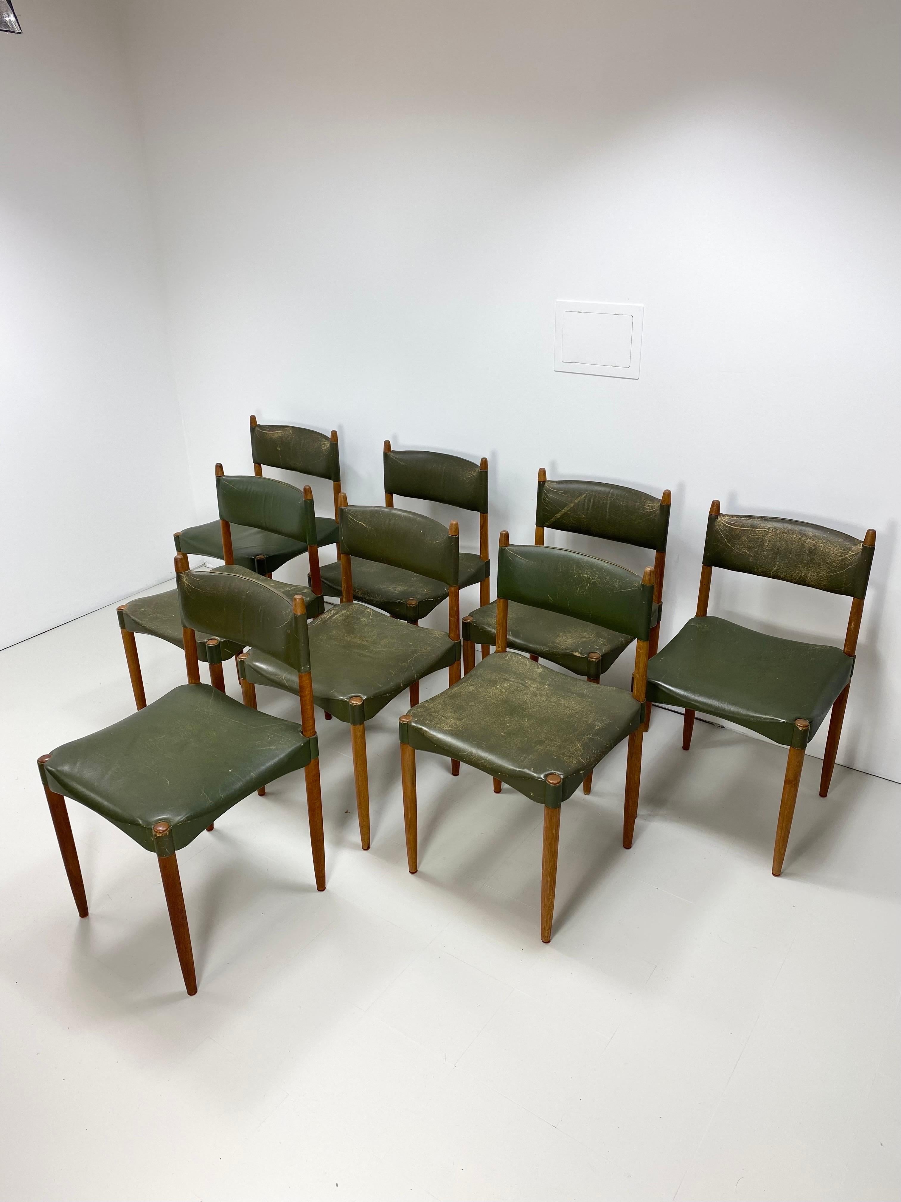 Set of 8 Dining Chairs by Anders Jensen. Teak wood frames with original green leather. Denmark, 1950’s

We offer delivery to NYC for $399.  Please inquire.