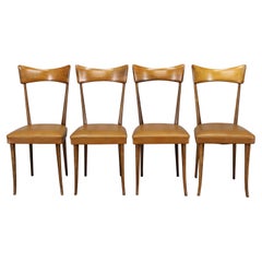 Juego de cuatro sillas de comedor italianas de los años 50