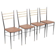 1950 - Ensemble de quatre chaises de salle à manger italiennes de style Gio Ponti en bronze et laiton