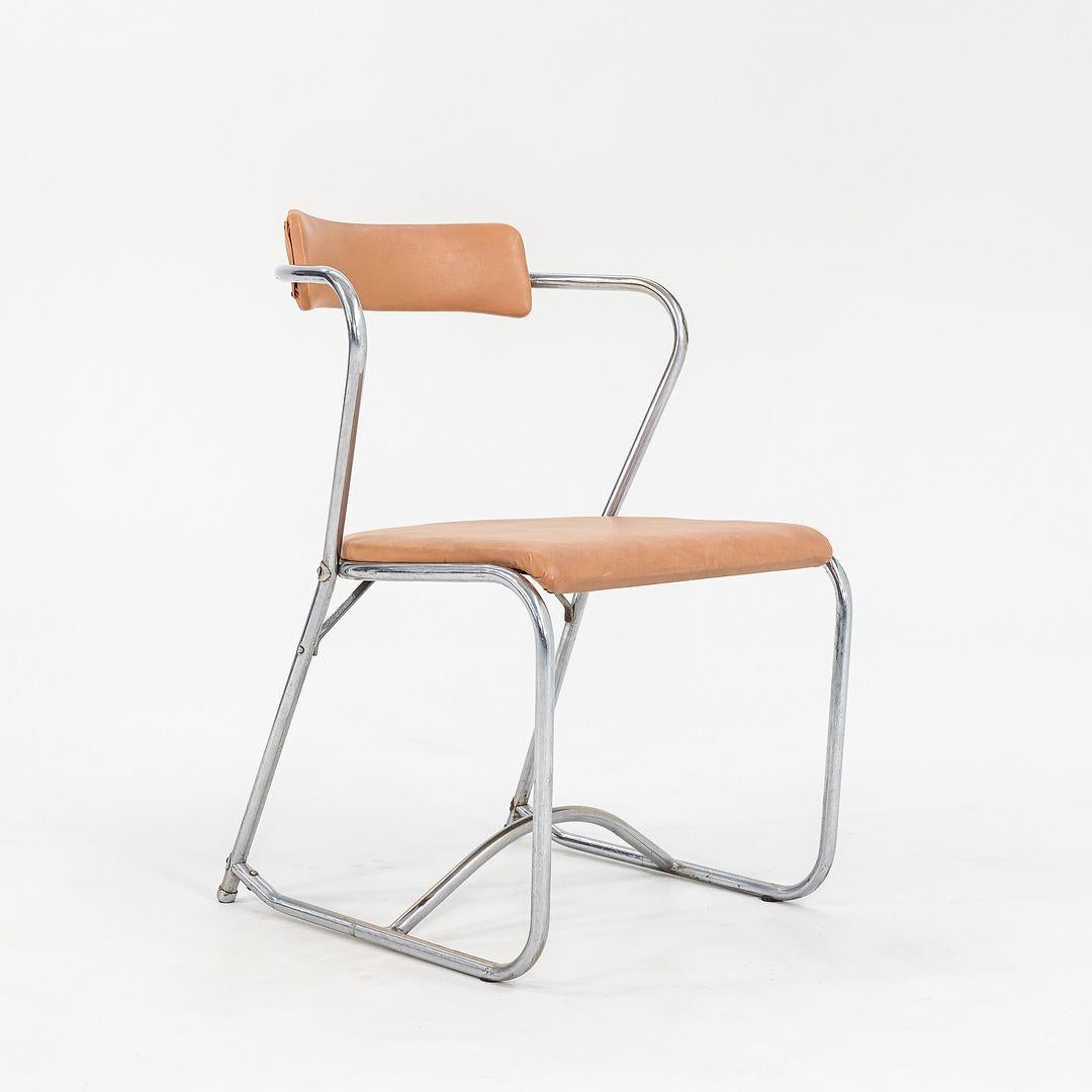 This is a set of four Bent Tubular Steel Dining Chairs, designed by Lewis Larsen for the Lloyd Loom Company in ca. 1942. Lloyd Loom was operating under the ownership of the Haywood-Wakefield Company during the time of their production. The original