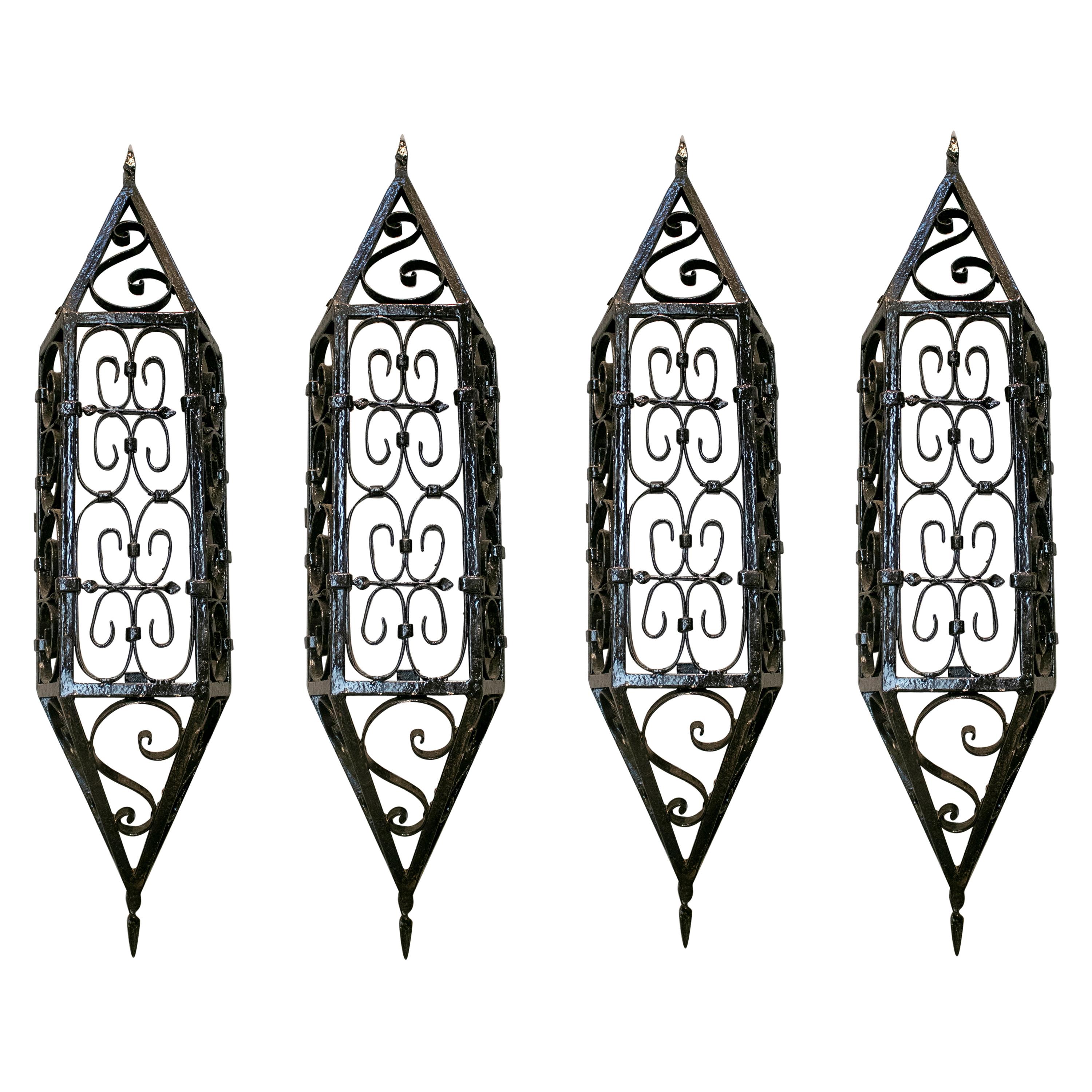 1950s Set of Four Spanish Wrought Iron Wall Lamps Painted in Black For Sale