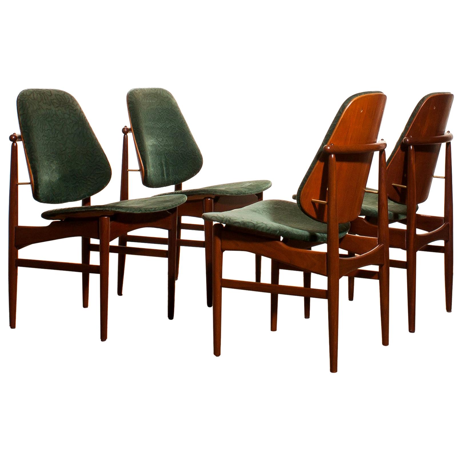 Beautiful set of four Arne Hovmand-Olsen design armchairs for Hovmand-Olsen & Jutex, Denmark.
The (original) fabric needs to be replaced!
These chairs sit extremely comfortable and are beautifully finished with beautiful bronze details.
The teak