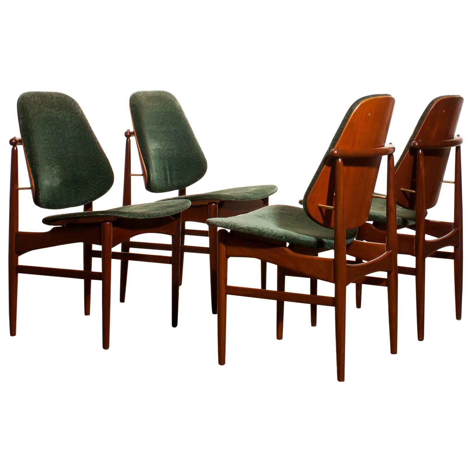 Beautiful set of four Arne Vodder design armchairs made by France & Daverkosen, Denmark.
The ( original ) fabric needs to be replaced!
These chairs sit extremely comfortable and are beautifully finished with beautiful bronze details.
The teak wooden