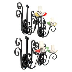 1950s Set of Four Vallauris Like Ceramic and Wrought Iron Sconces