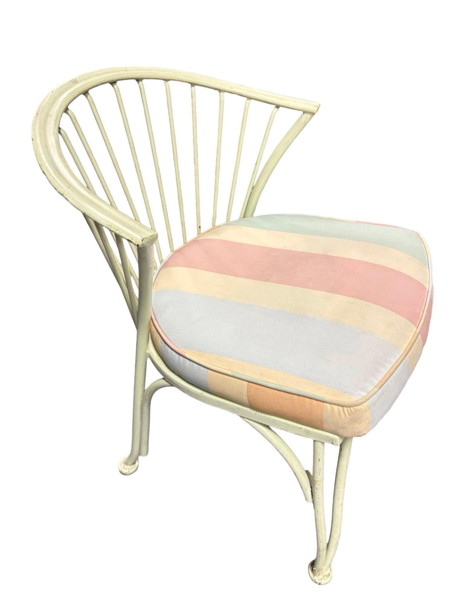 This elegant set of four Pinecrest outdoor armchairs effortlessly blends timeless design with durable craftsmanship. Crafted from sturdy wrought iron, the chairs showcase graceful curves and intricate detailing, finished in a charming pastel green