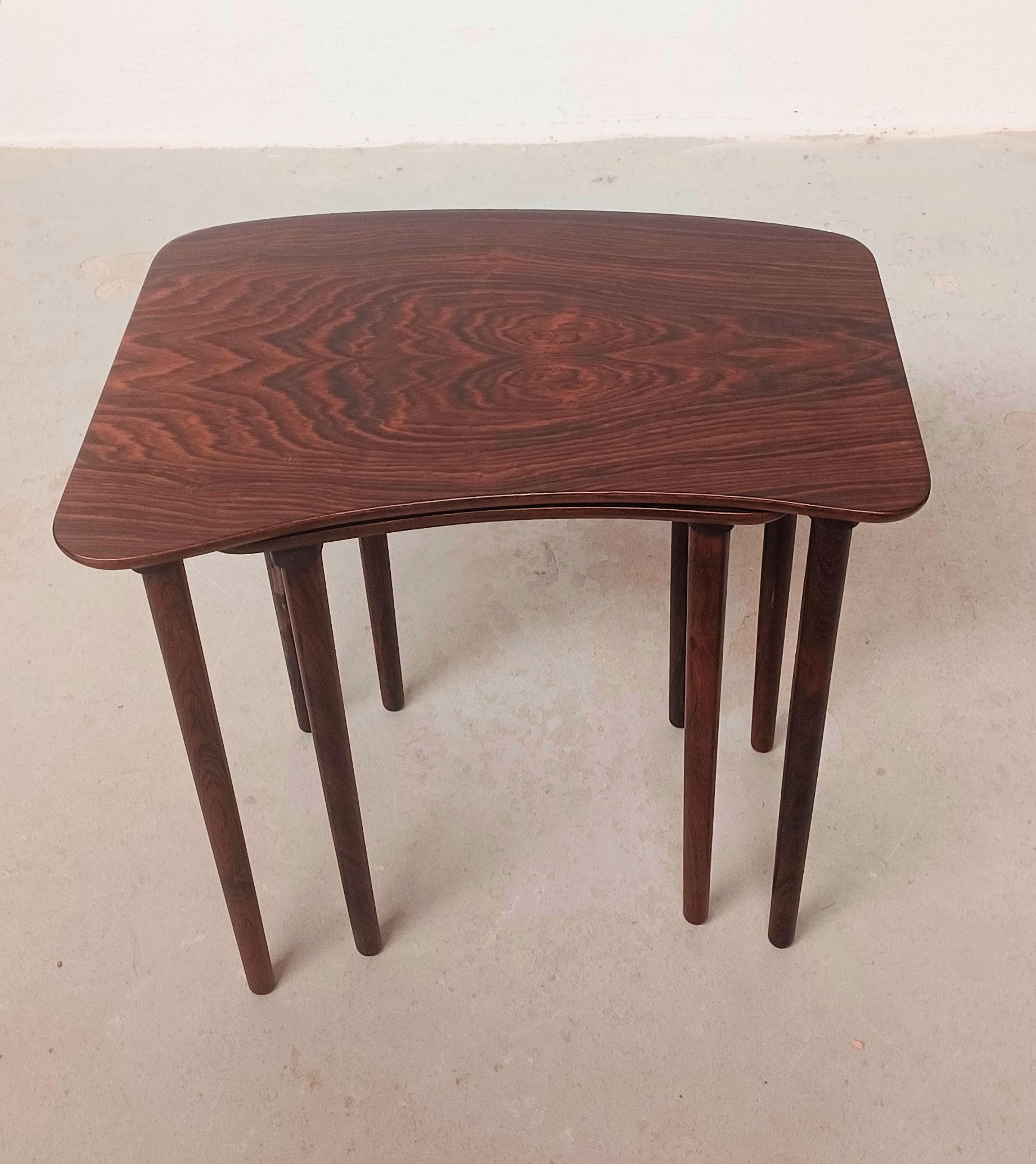 1950s set of two fully restored Danish rosewood nesting tables

Rosewood mid-century bean shaped nesting tables made in a rich grained rosewood 

The tables have been fully restored by our professional cabinetmakers to ensure that they are in