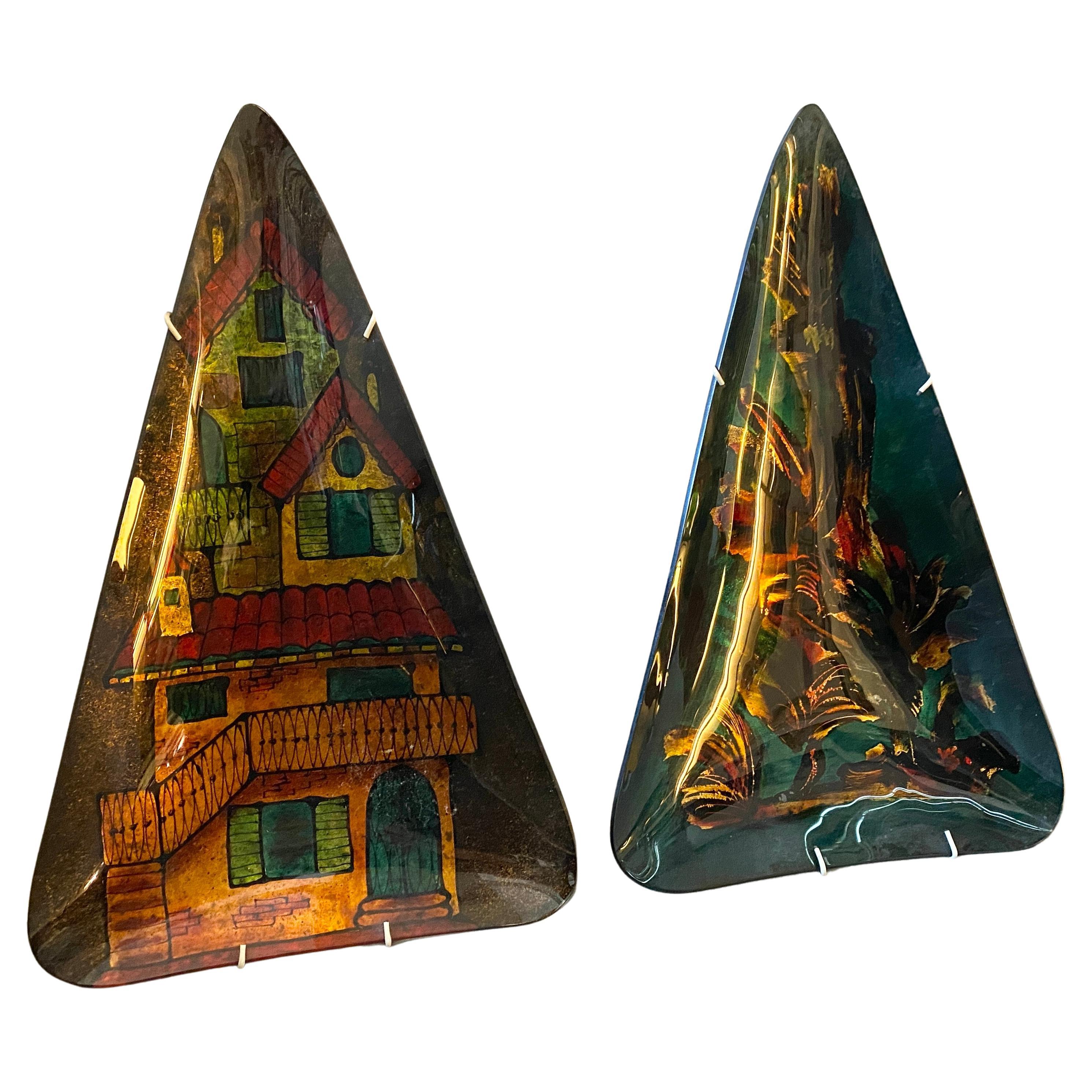 Two under enameled paintings on triangular mural glass plates manufactured in Italy in the Fifties. They are very nice Mid-Century Modern wall decorations and in perfect conditions.