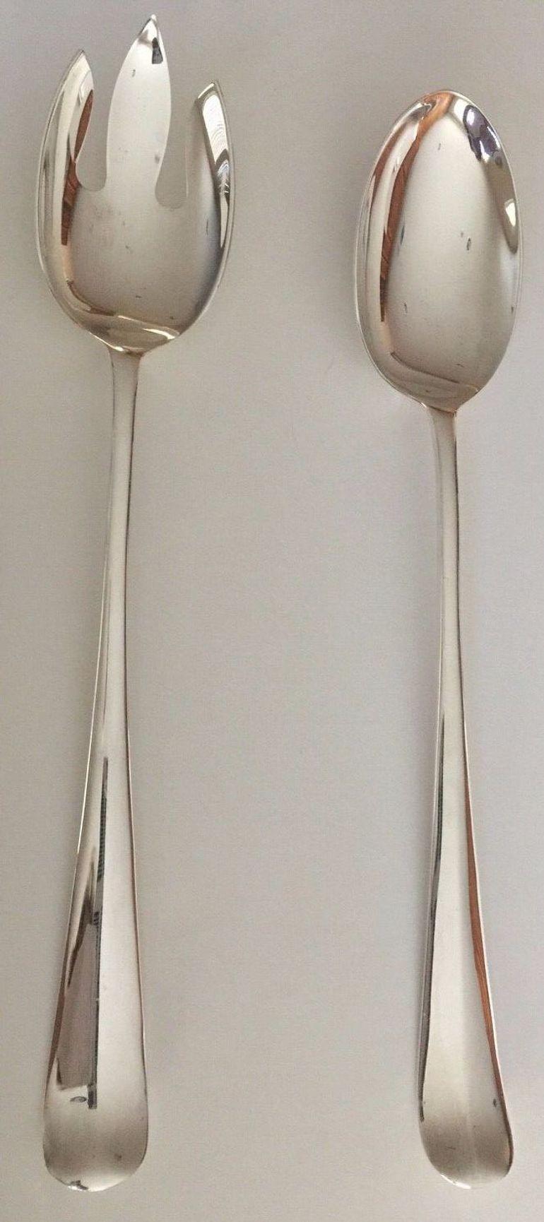 1950s Two Pieces Salad Serving Set Silver Plate Hallmark England 4915.
SG Hall Mark England Large Silver Plate Serving Spoon and Fork Set.
England Hallmark SG A-1 Silver Plate Serving Fork and Spoon in Original Bags and Box.
Mid 20th Century large