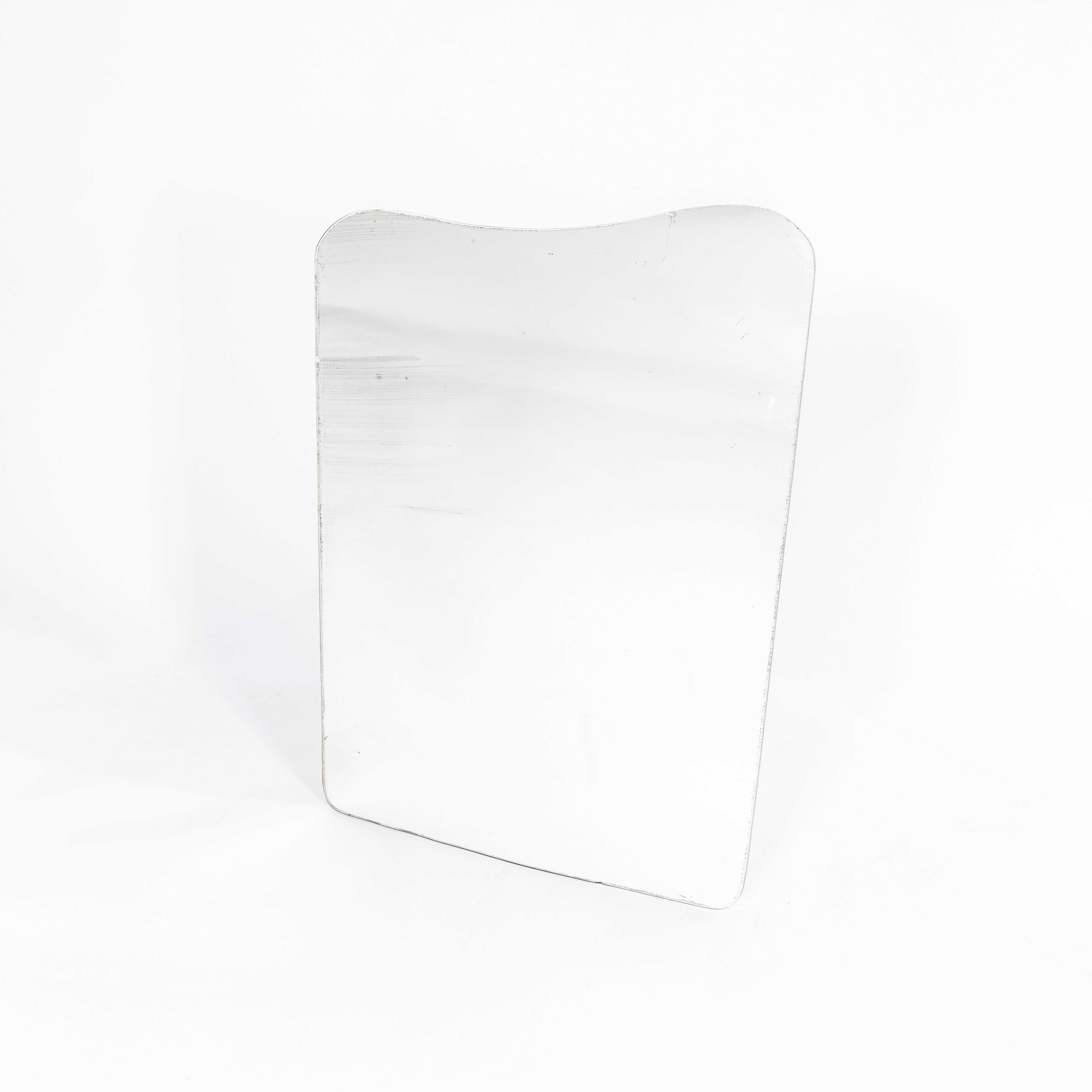 1950’s Shaped Dressing Room Mirror. 
Nothing beats a good mirror and we buy them for the quality of the glass and the foxing, the level of deterioration in the mirror film that gives the mirror the character. This is a glass mirror, not backed, best