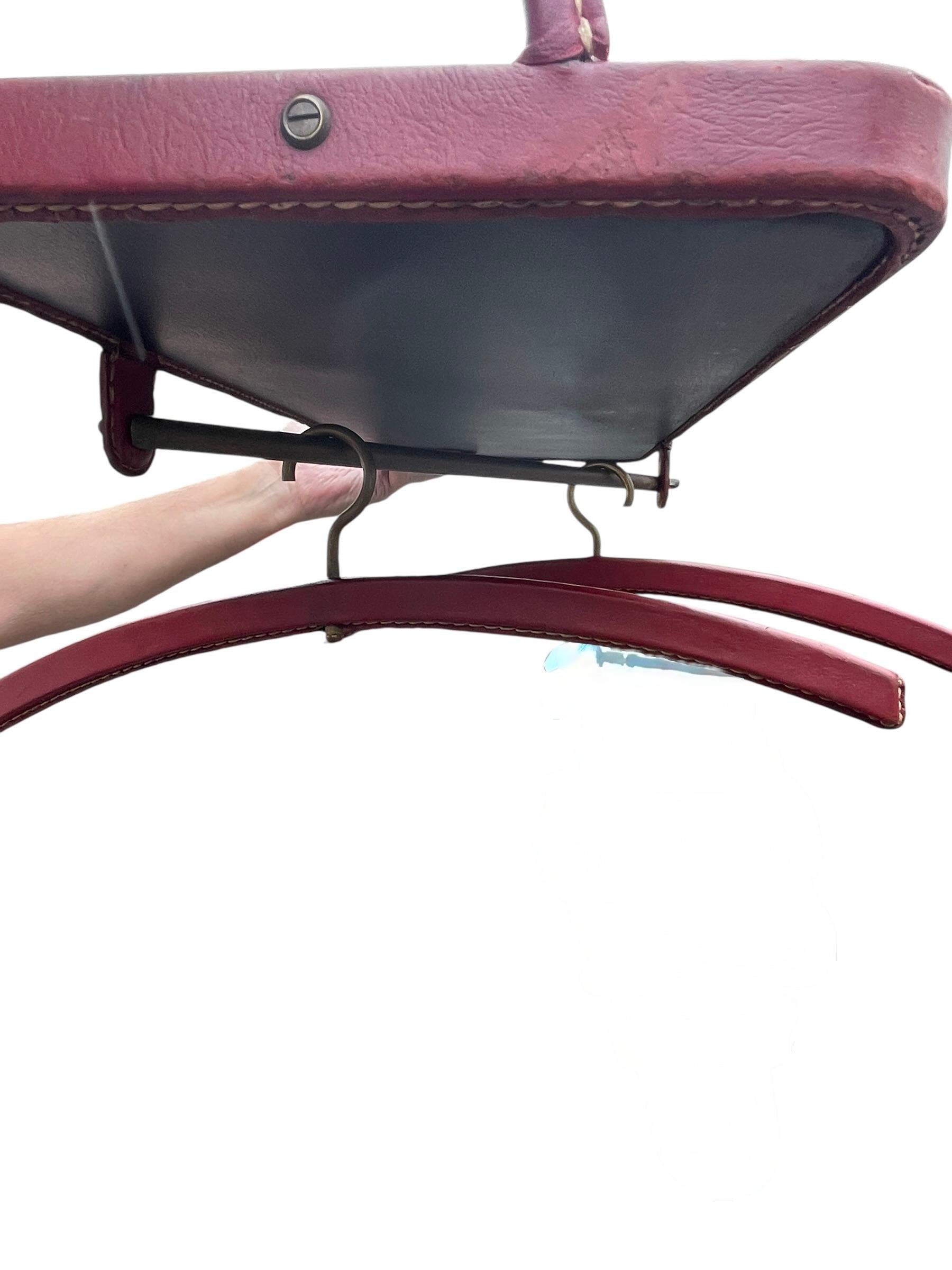 1950's Shelve with two coat hangers by Jacques Adnet For Sale 1