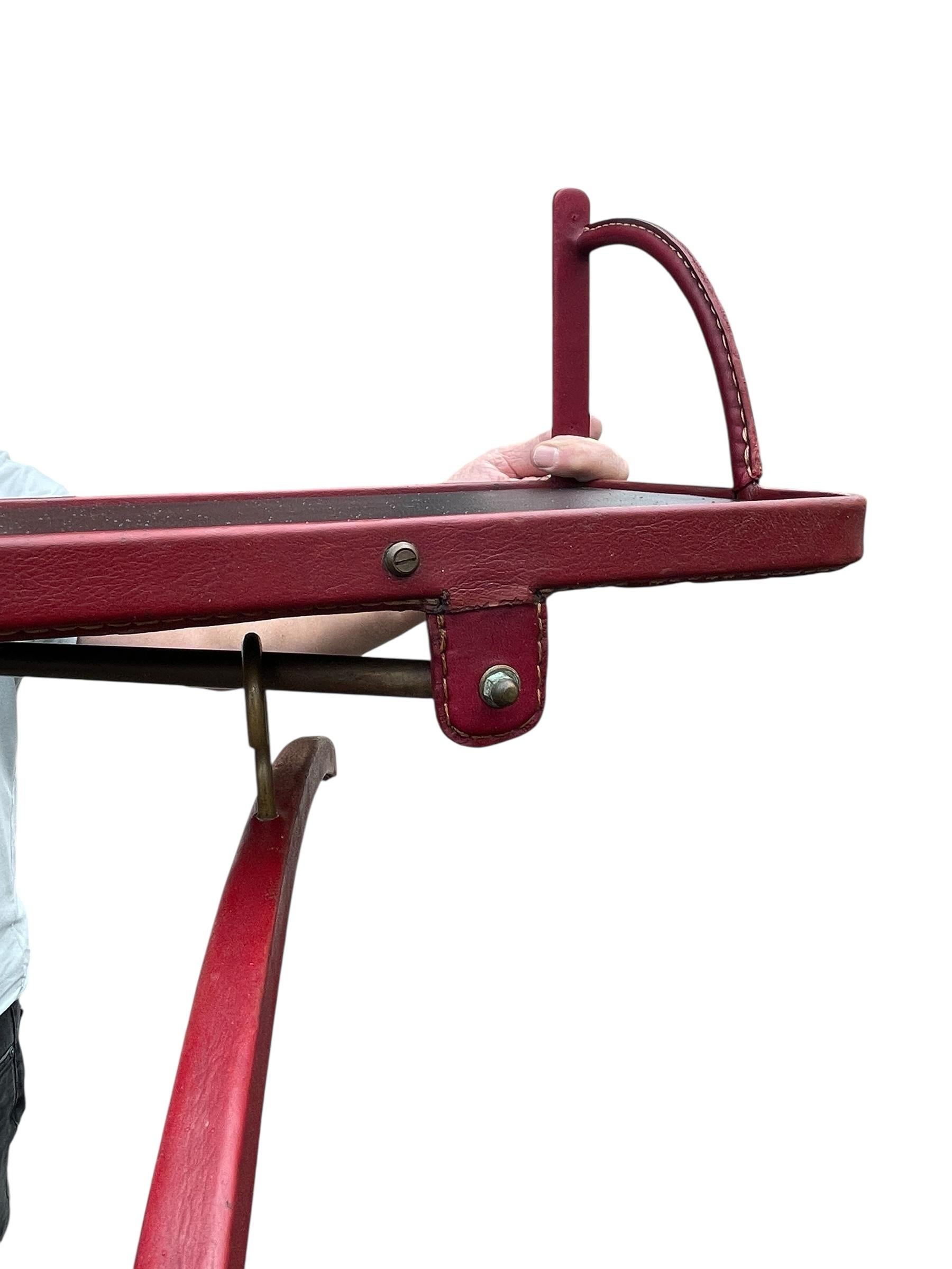 1950's Shelve with two coat hangers by Jacques Adnet For Sale 2