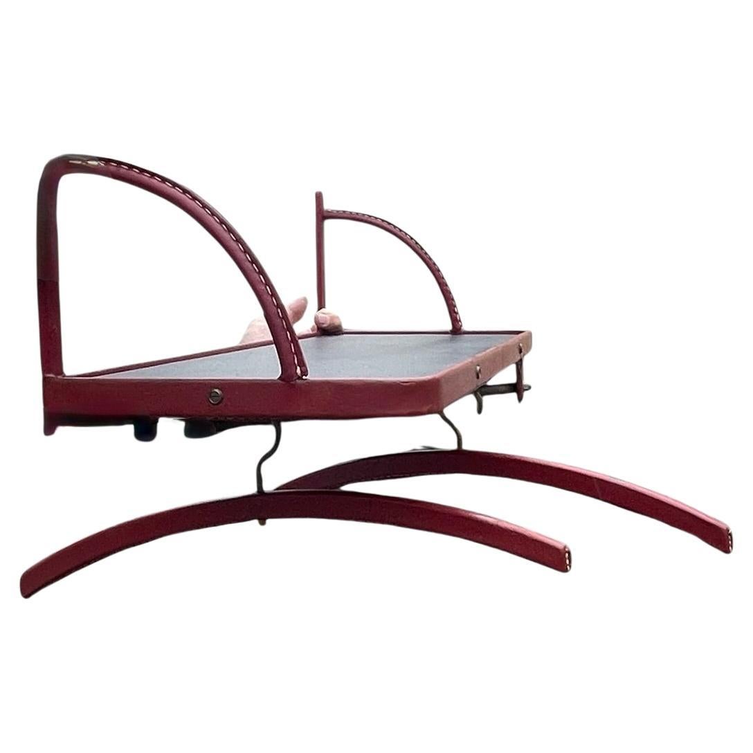 1950's Shelve with two coat hangers by Jacques Adnet For Sale