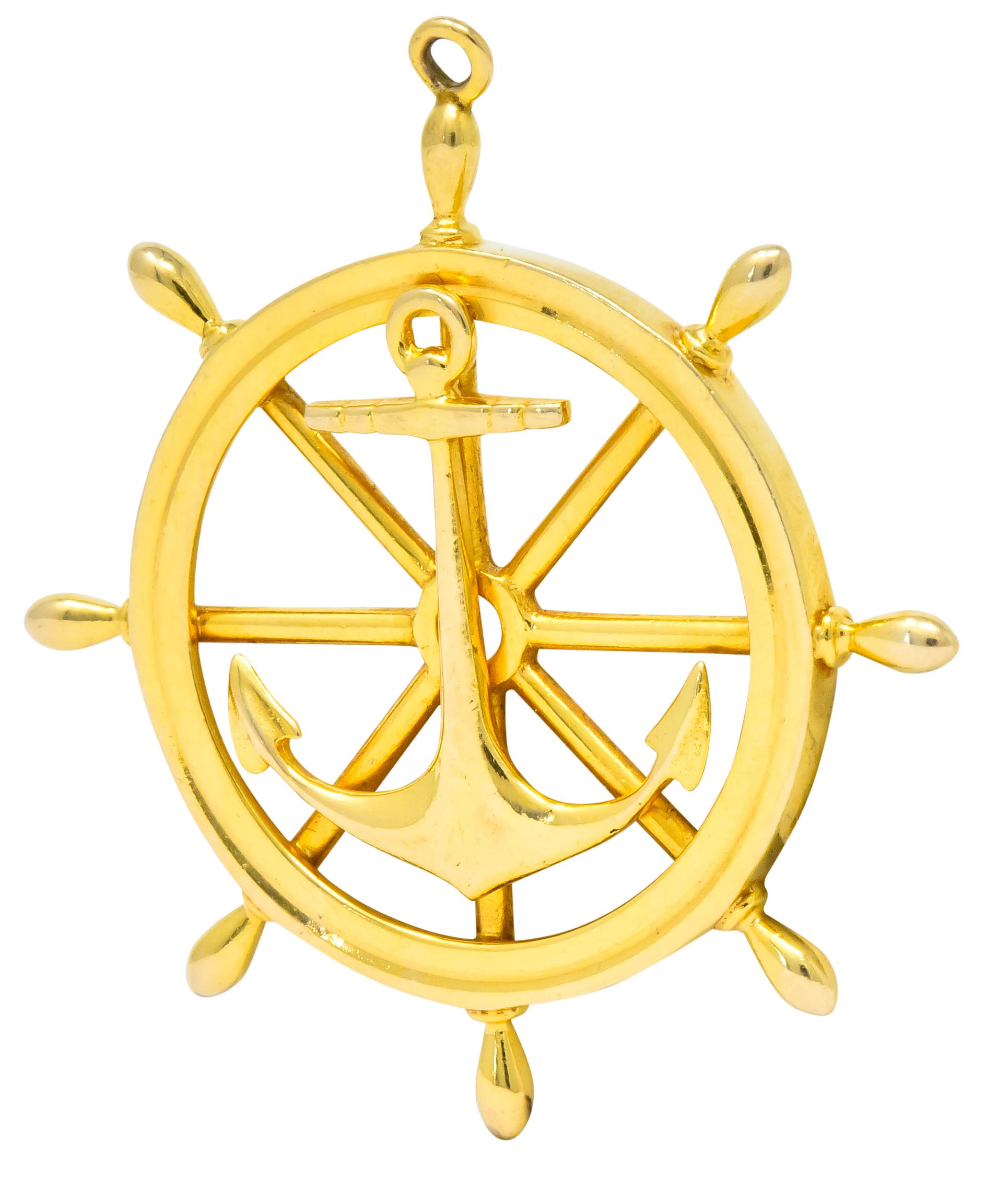 Pendant designed as a ship's wheel centering an anchor

Completed by jump ring at top of wheel

Tested as 14 karat gold

Measures: 1 3/4 x 5/8 inches

Circa 1950

Total weight: 9.1 grams

Memento. Adventure. Sailing.
 

 

Stock Number: We- 3118