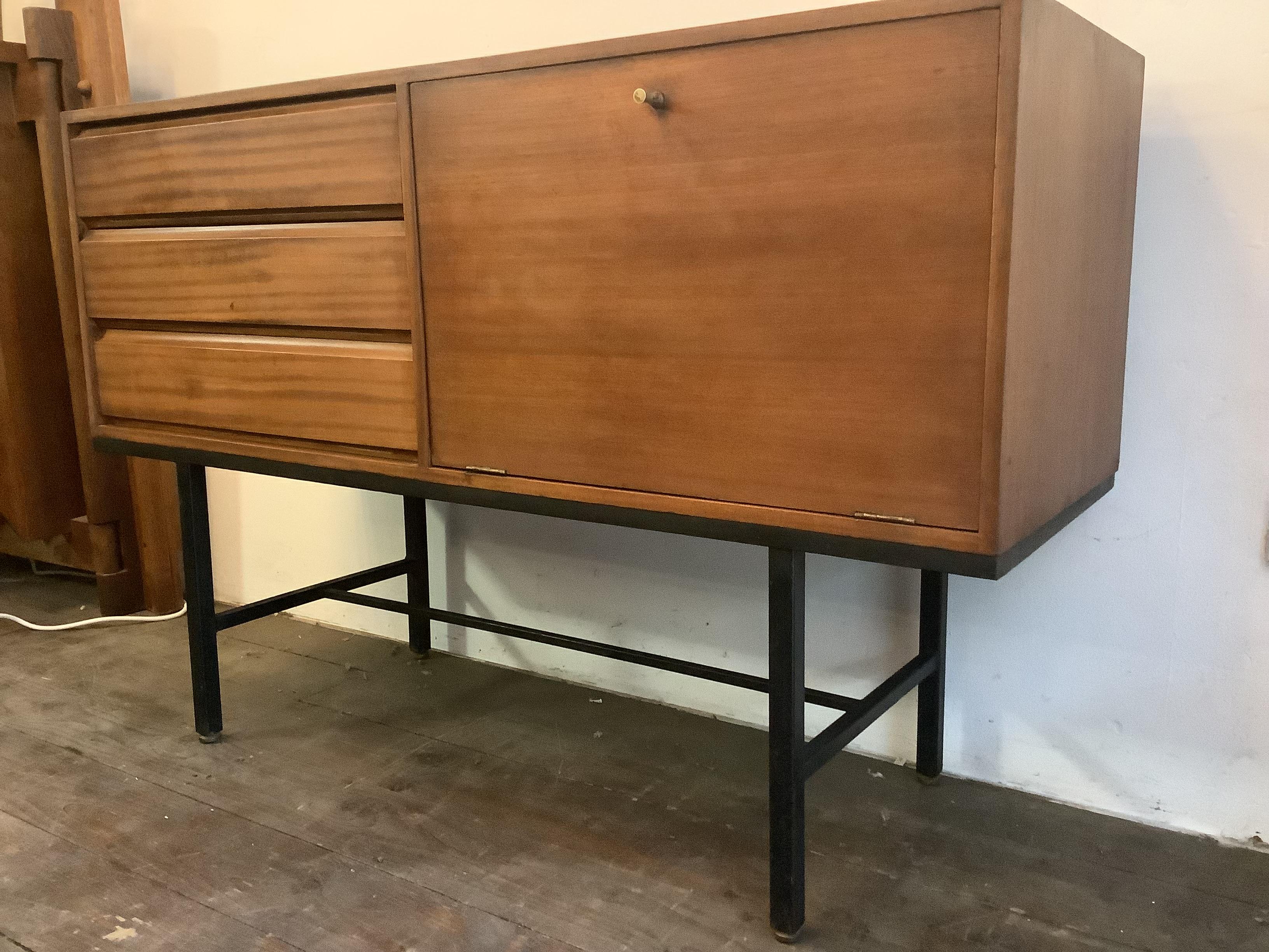 1950s Credenza designed and Manufactured by 
Bowman Brothers of Camden Town founded by Thomas Bowman in 1871

Modernists design with pull down door and three storage 
Draws.