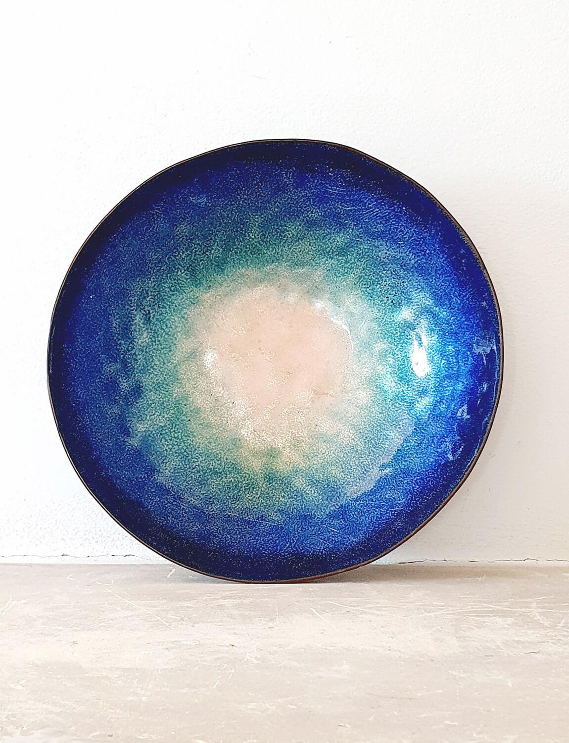 A particularly beautiful example of a Paolo de Poli bowl. Paolo di Poli, the Italian artist, was born in 1905 and died in 1996. This bowl is signed Paolo di Poli on the base and is made of copper with an exceptional blue and turquoise enamelled