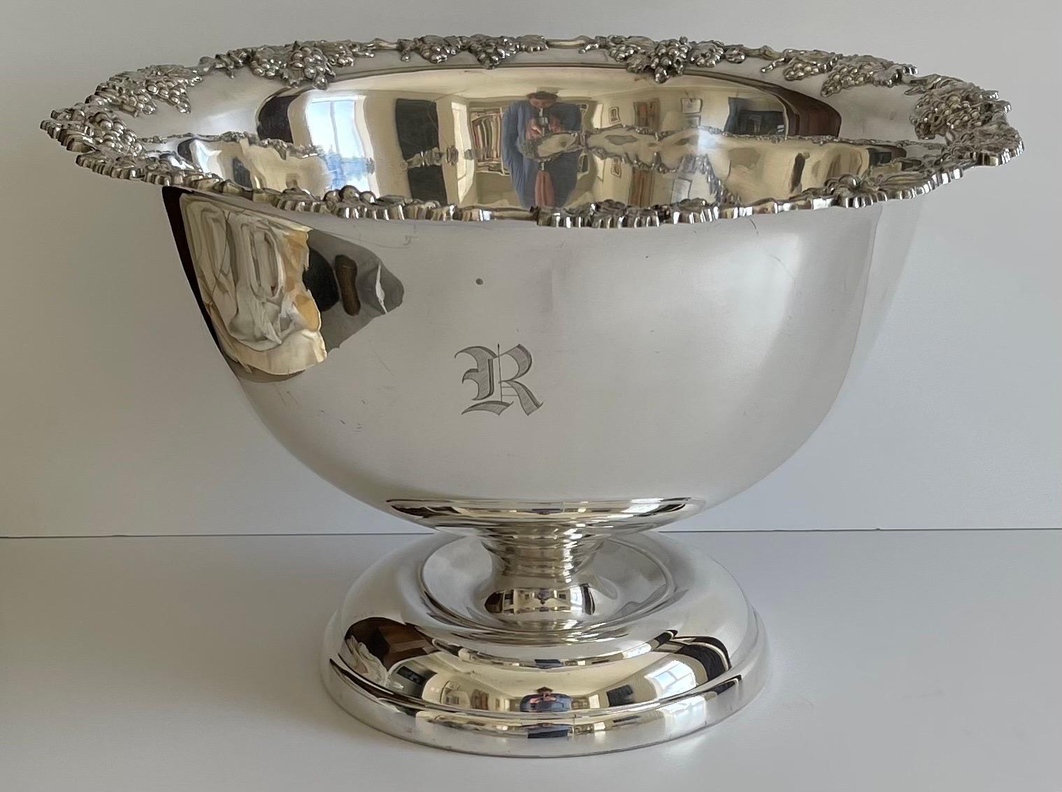 Large 1950s silver plated punch bowl. Hand engraved R single letter monogram. Newly re-plated and polished to a high shine.