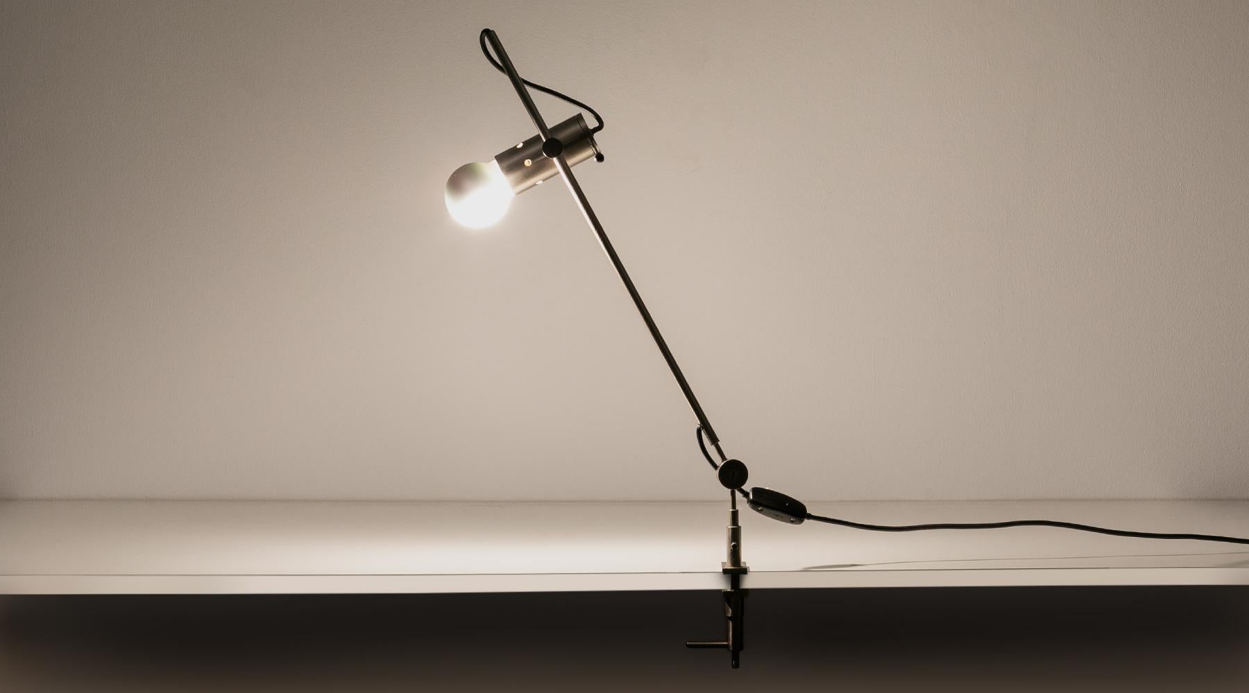 Desk lamp, nickel-plated metal, Tito Agnoli, Italy, 1955.

This desk lamp was created from the Cornalux series which was Tito Agnoli´s first eyebrow raiser during his time at O-Luce. The lamp is adjustable in two ways, once on the head, as well as