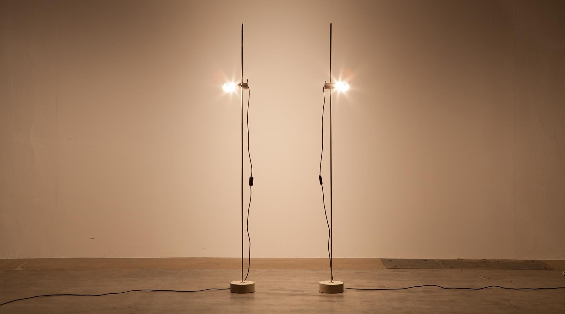 Pair of floor lamps, nickel-plated metal, Tito Agnoli, Italy, 1954.

These two floor lamps are from the Cornalux series and Tito Agnoli´s first eyebrow raiser during his time at O-Luce. The Cornalux, a Hammer shaped, blown, hand assembled light
