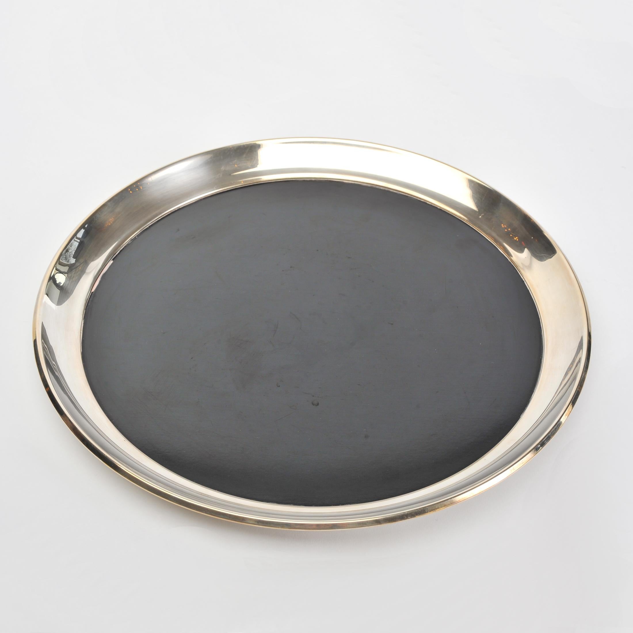 Simple elegance: 1950s US silver plated tray with black laminate centre. Maker stamped Gorham Silver