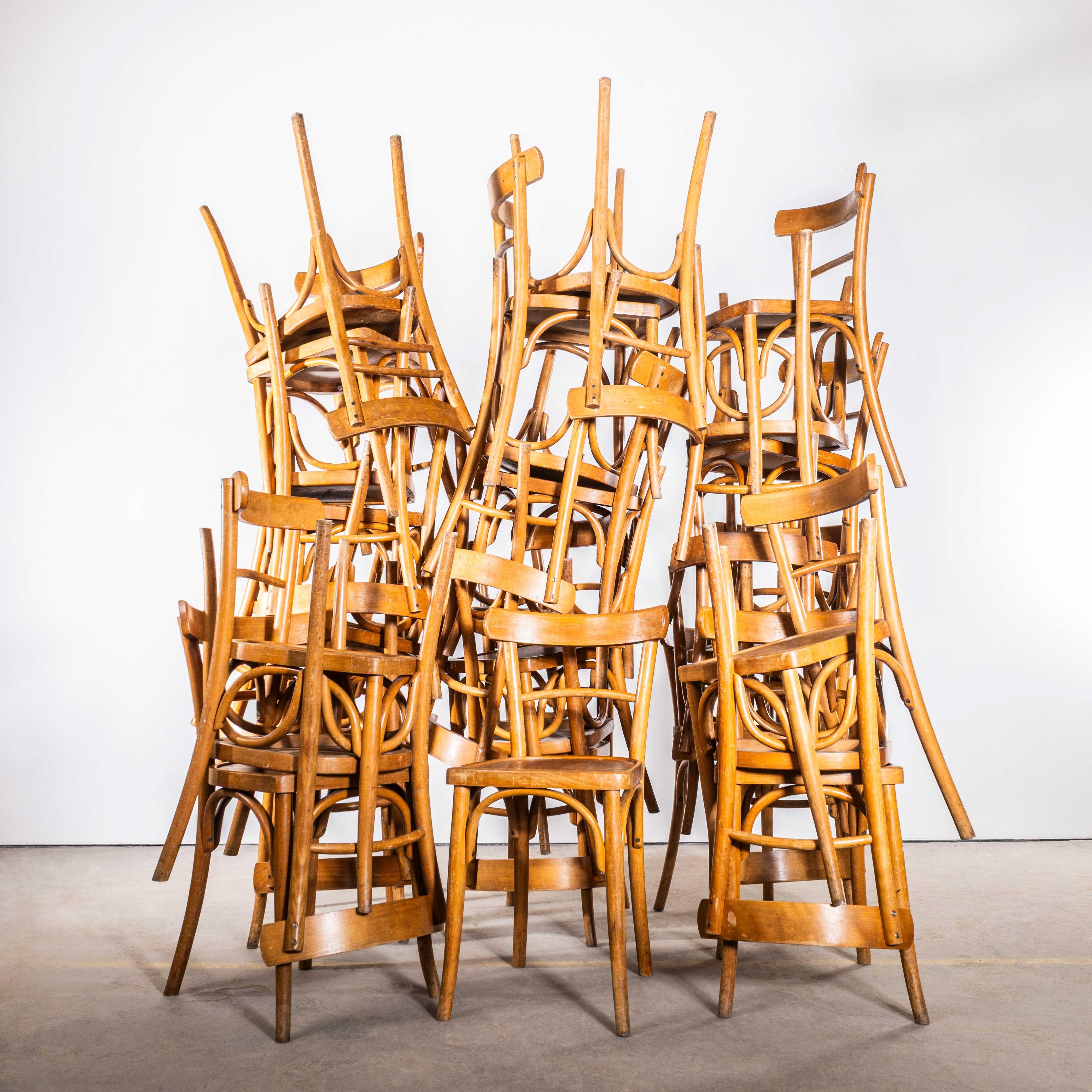 1950’s Simple French Bistro Dining Chairs – Large Quantity Available. 

The process of steam bending beech to create elegant chairs was discovered and developed by Thonet, but when its patents expired in 1869 many companies including Luterma