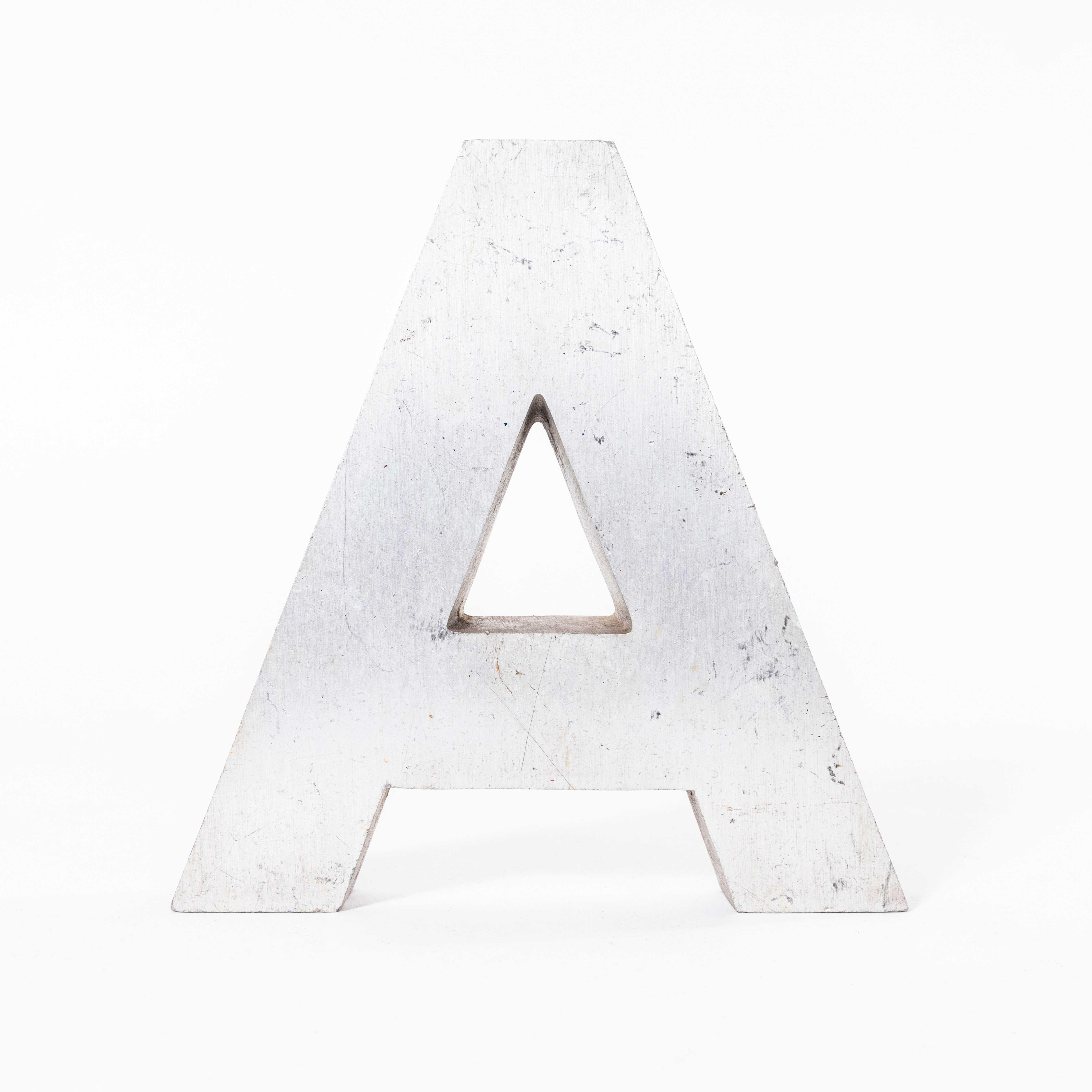 1950’s Small Cast Aluminium Sign Letter – A. 
Heavy quality American cast aluminium signage letter. Listing for a single letter as photographed. Other group images are included for inspiration.

Workshop Report:
Our workshop team inspect every