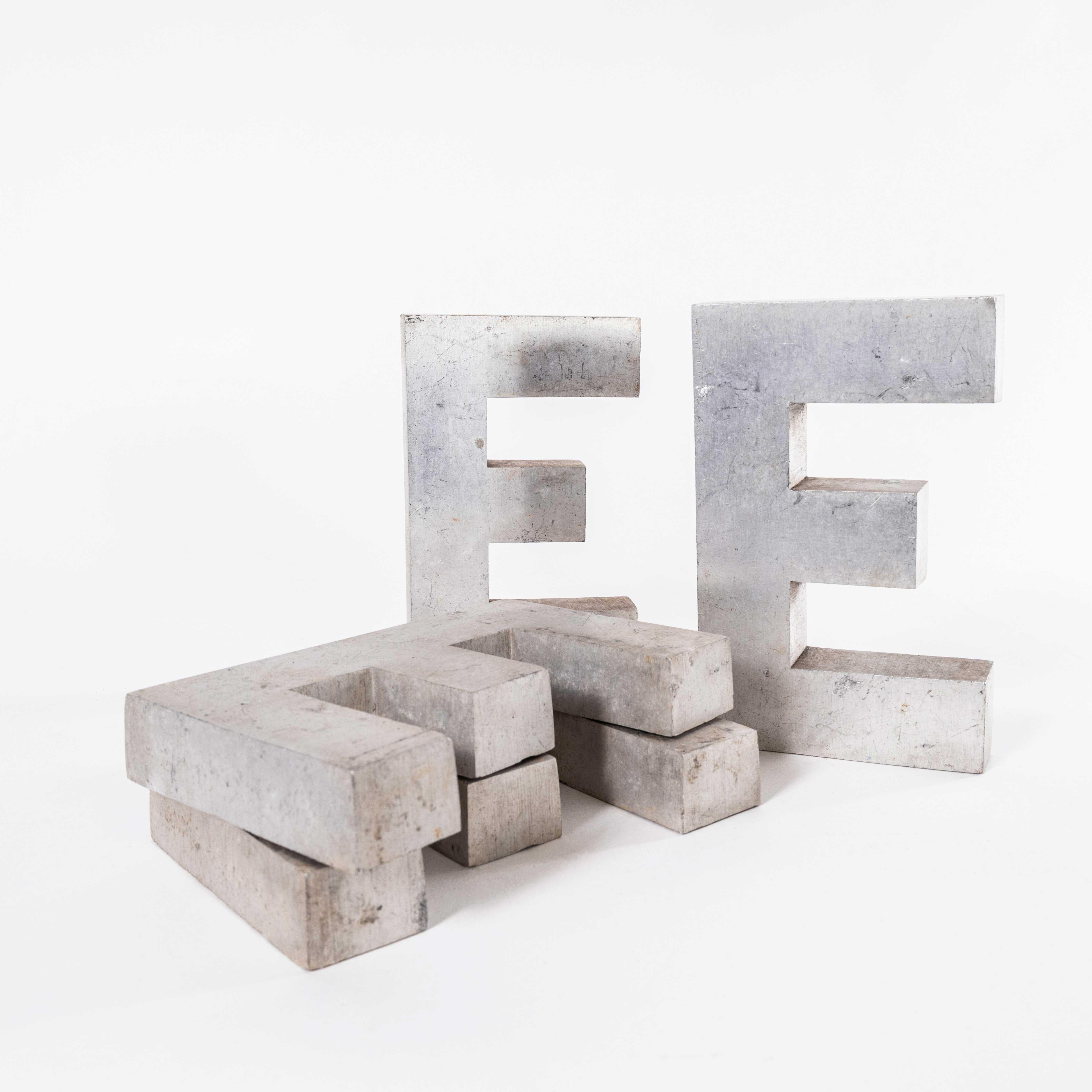 1950’s Small Cast Aluminium Sign Letter – E. 
Heavy quality American cast aluminium signage letter. Listing for a single letter as photographed. Other group images are included for inspiration.

Workshop Report:
Our workshop team inspect every