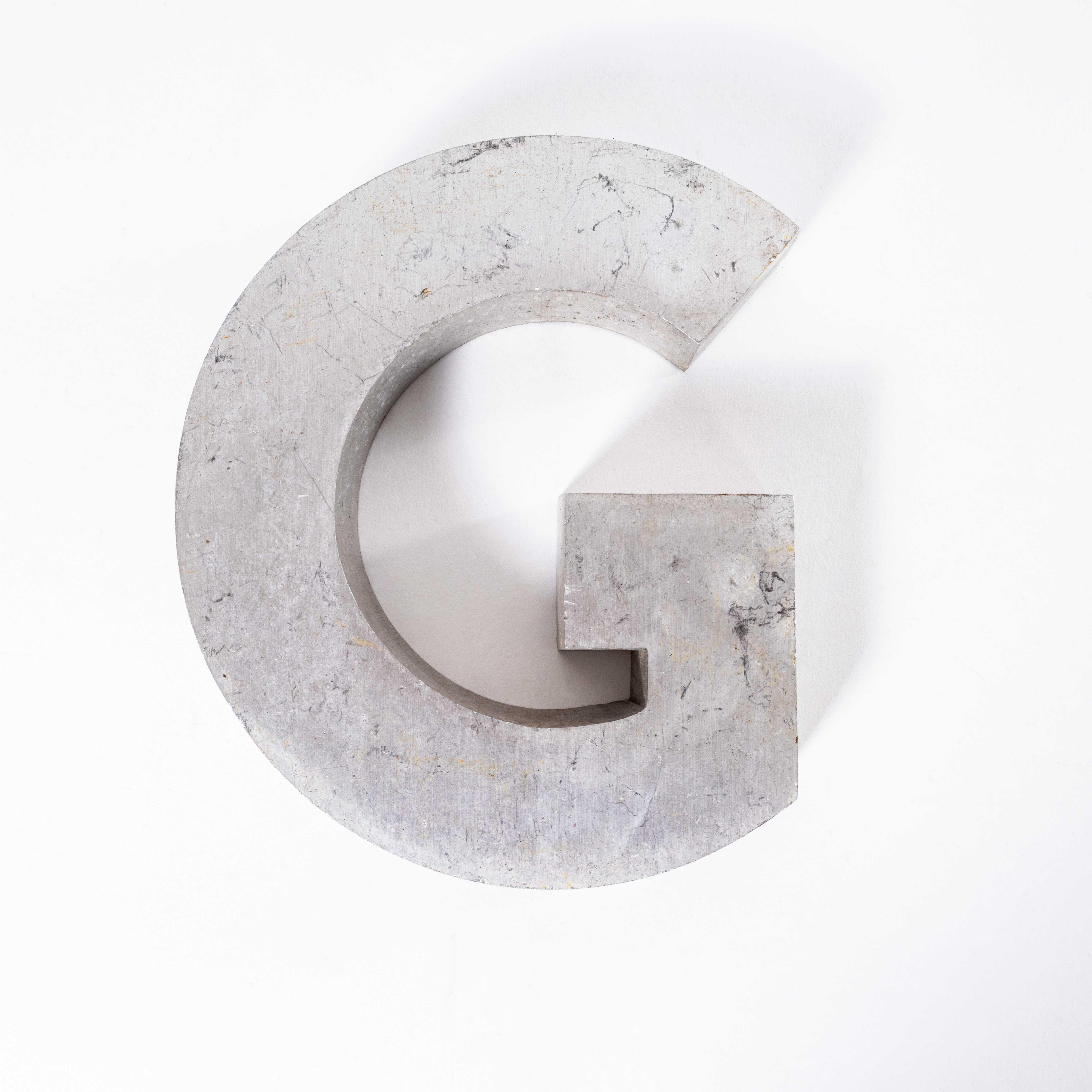 1950’s Small Cast Aluminium Sign Letter – G. 
Heavy quality American cast aluminium signage letter. Listing for a single letter as photographed. Other group images are included for inspiration.

Workshop Report:
Our workshop team inspect every
