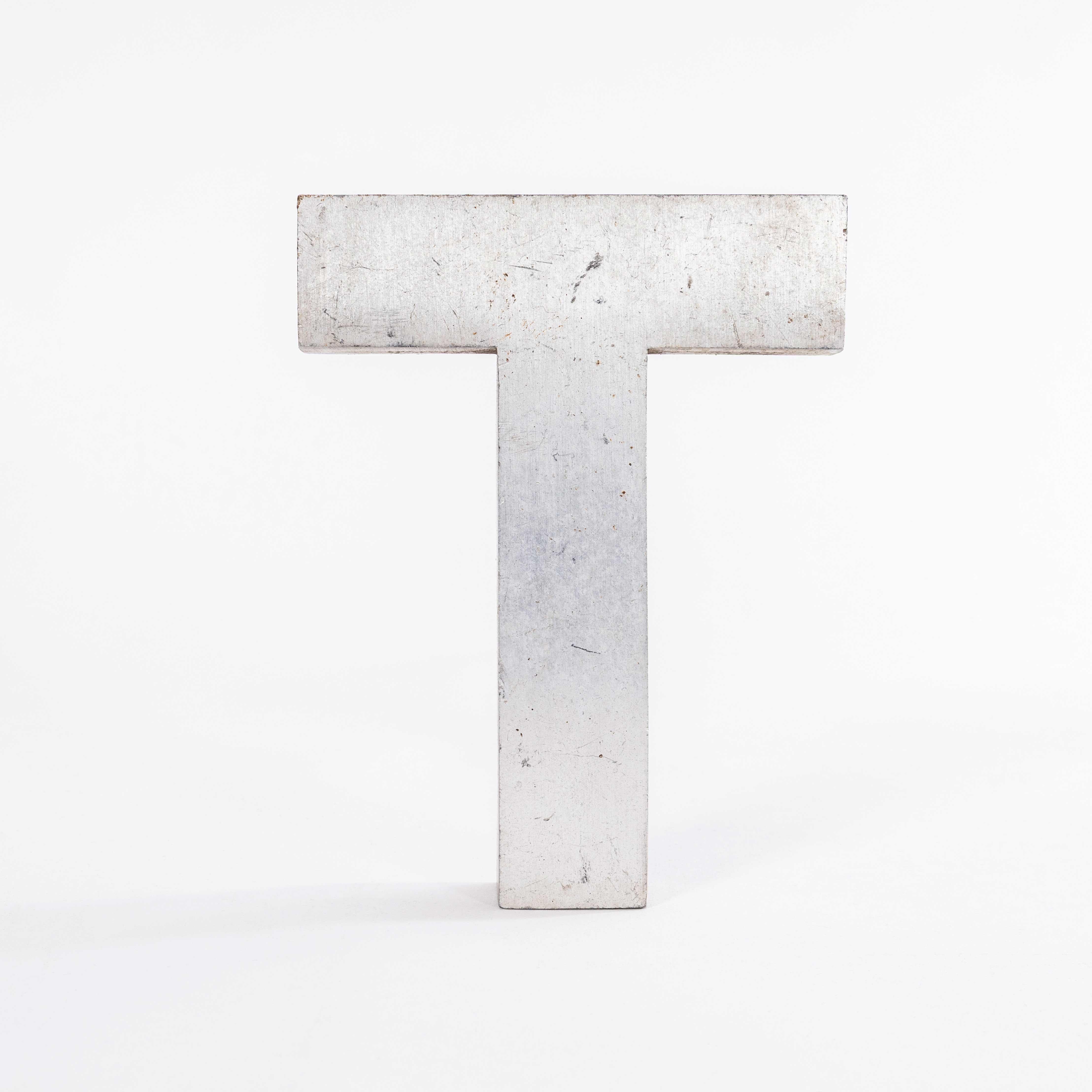 1950’s Small Cast Aluminium Sign Letter – T.
Heavy quality American cast aluminium signage letter. Listing for a single letter as photographed. Other group images are included for inspiration.

Workshop Report:
Our workshop team inspect every