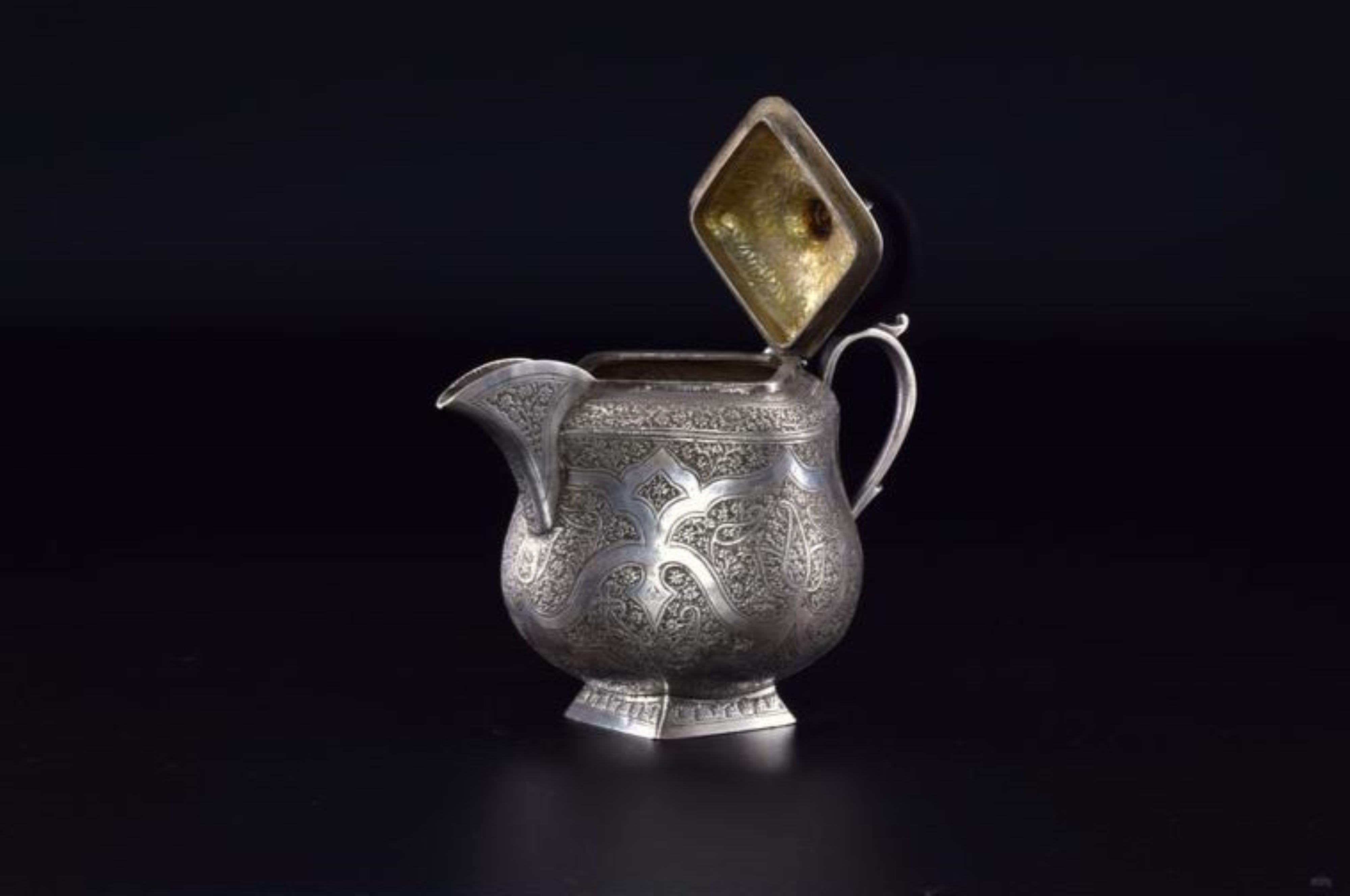 A handcrafted Moorish sterling small silver teapot handcrafted in the 1950s. What truly sets this piece apart are the intricate hand-engraved Moorish patterns.

Weighing 316g, this teapot is fully functional but can also stand as a decorative