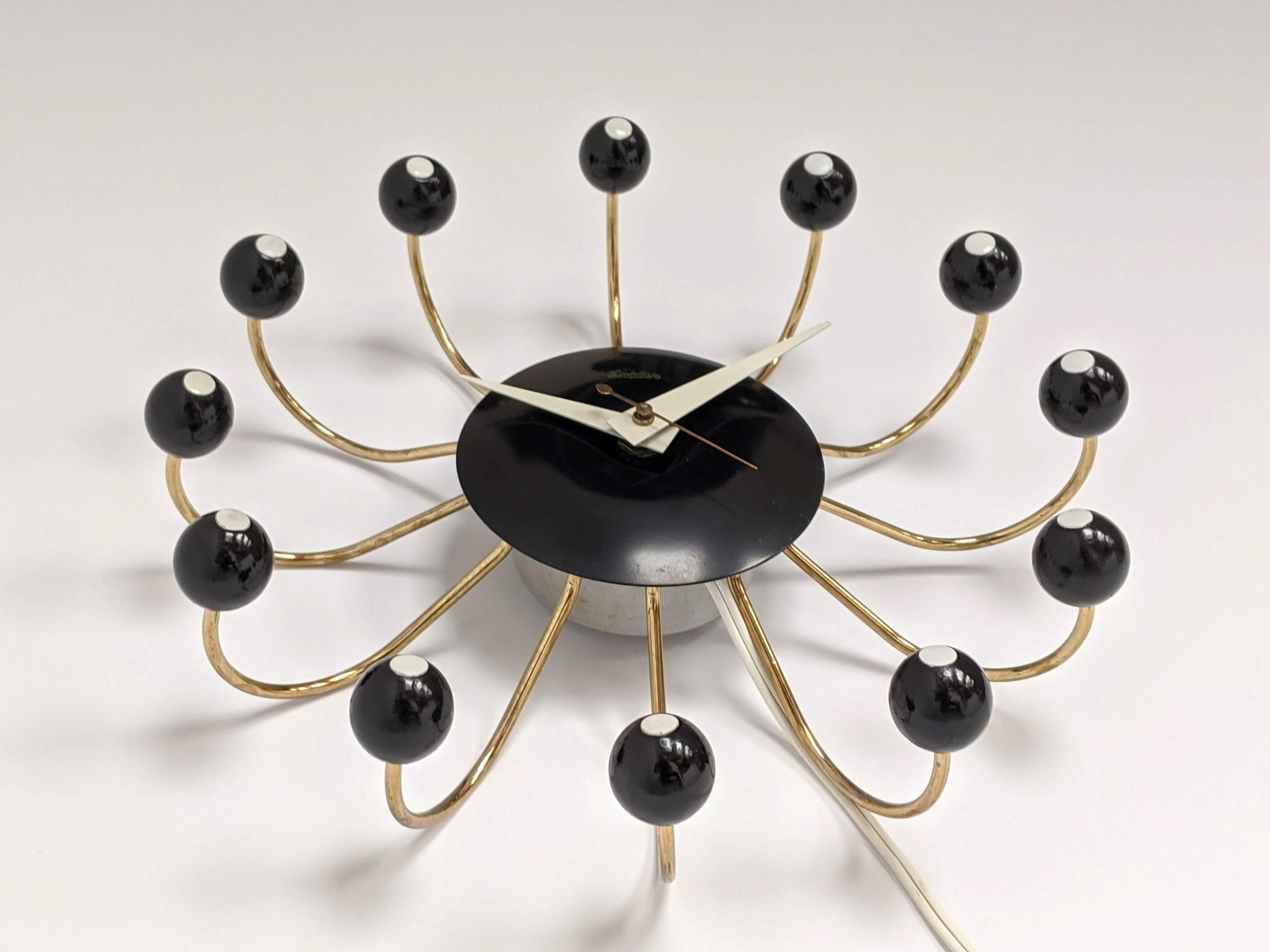 Enameled 1950s Snider Spider Electric Wall Clock