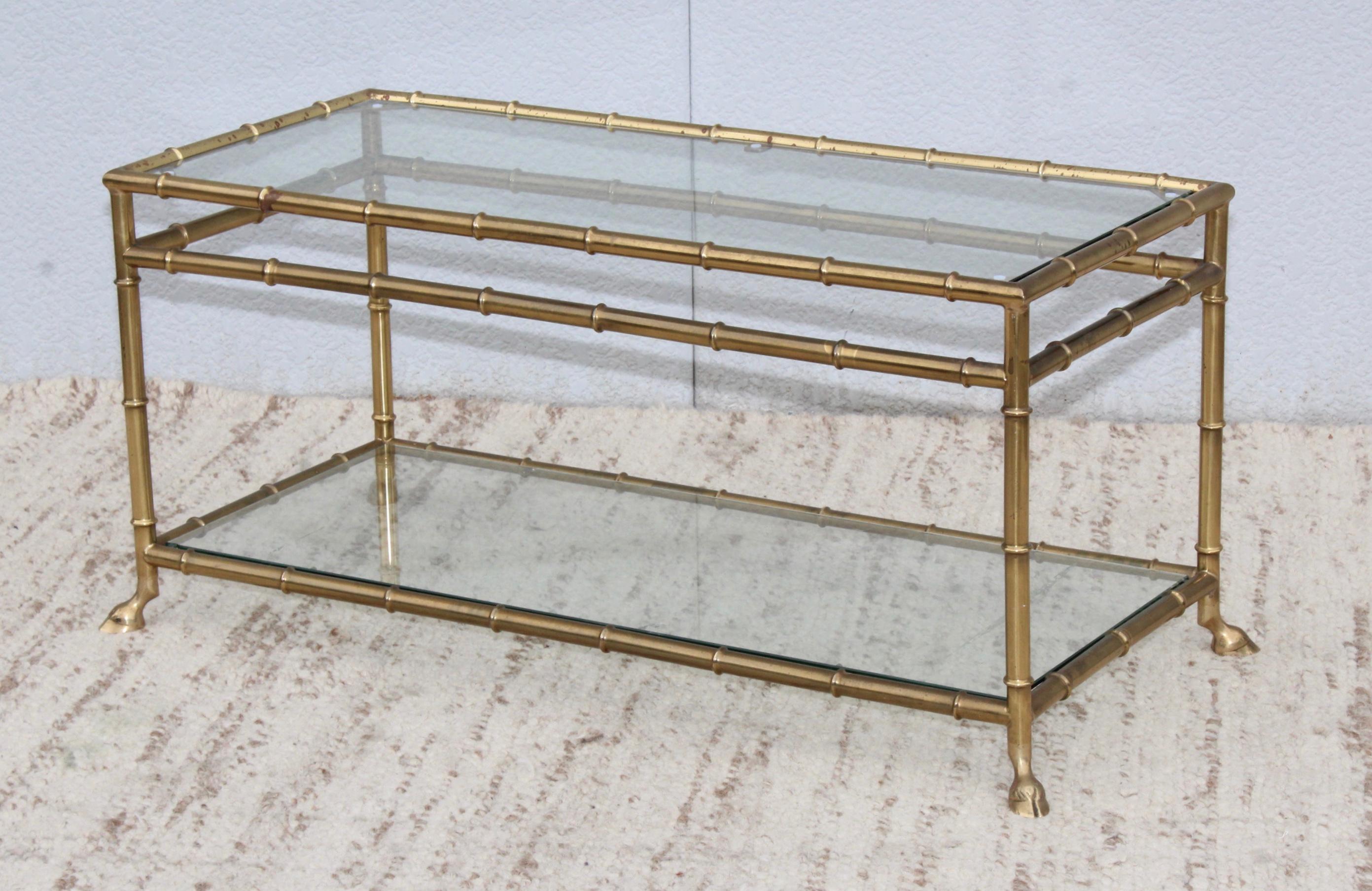 1950s solid brass faux bamboo with ram feet two-tier Italian coffee table, in vintage original condition with some wear and patina to the brass.