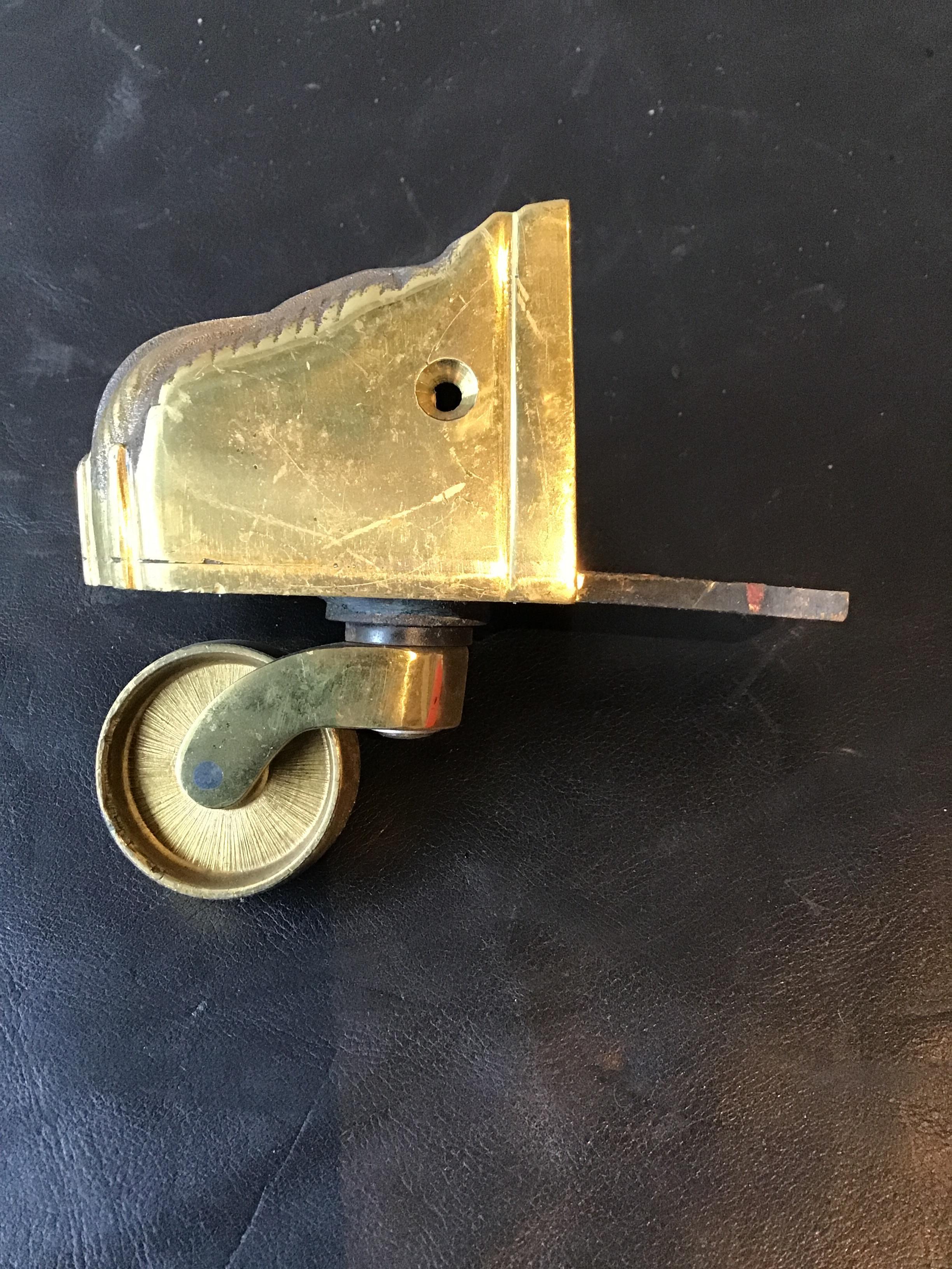 Sixteen 1950s Solid Brass Lion Paw Casters In Good Condition For Sale In Tarrytown, NY