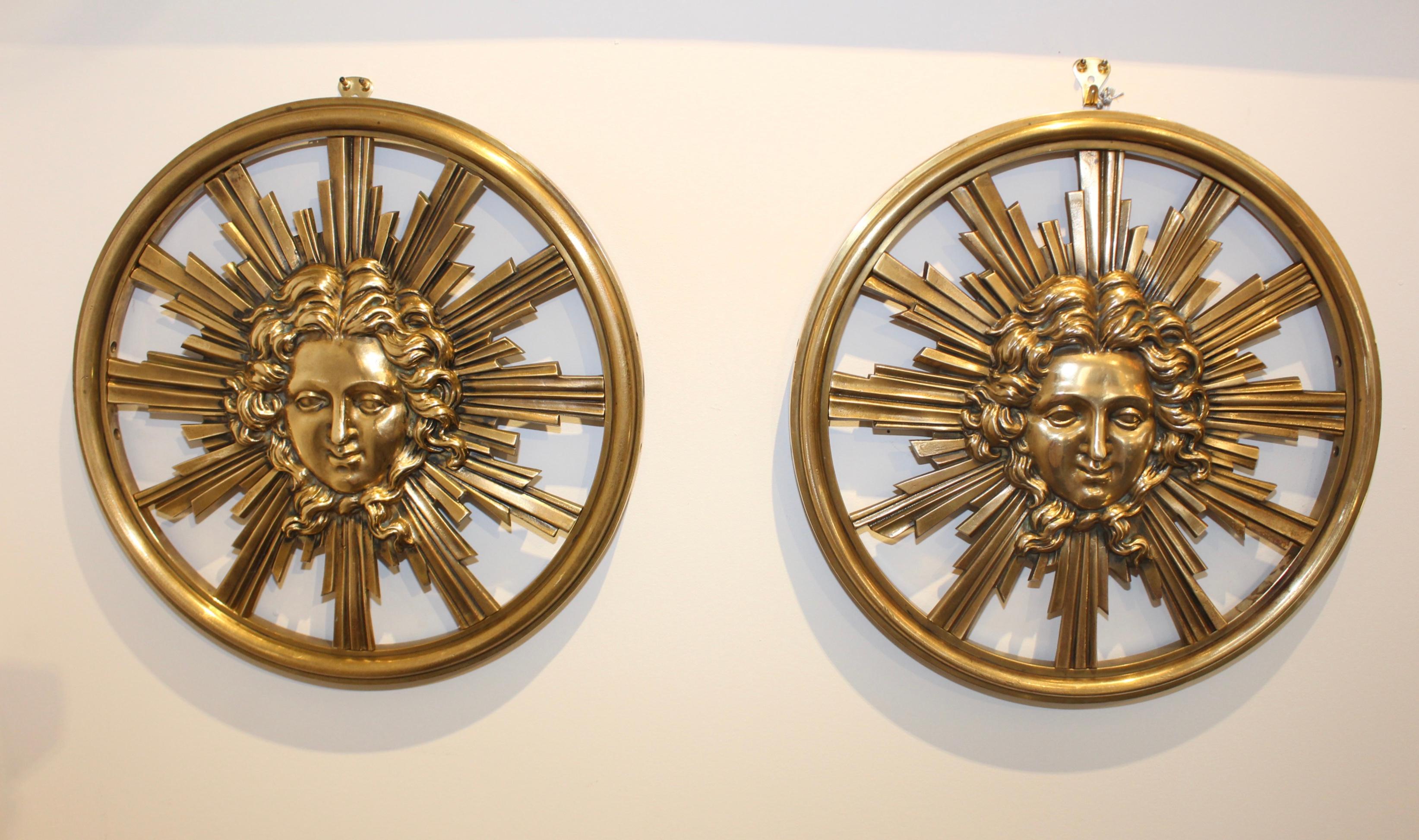 Stunning pair of large 1950s very heavy solid brass Medusa's wall sculptures, in vintage original condition with minor wear and patina.