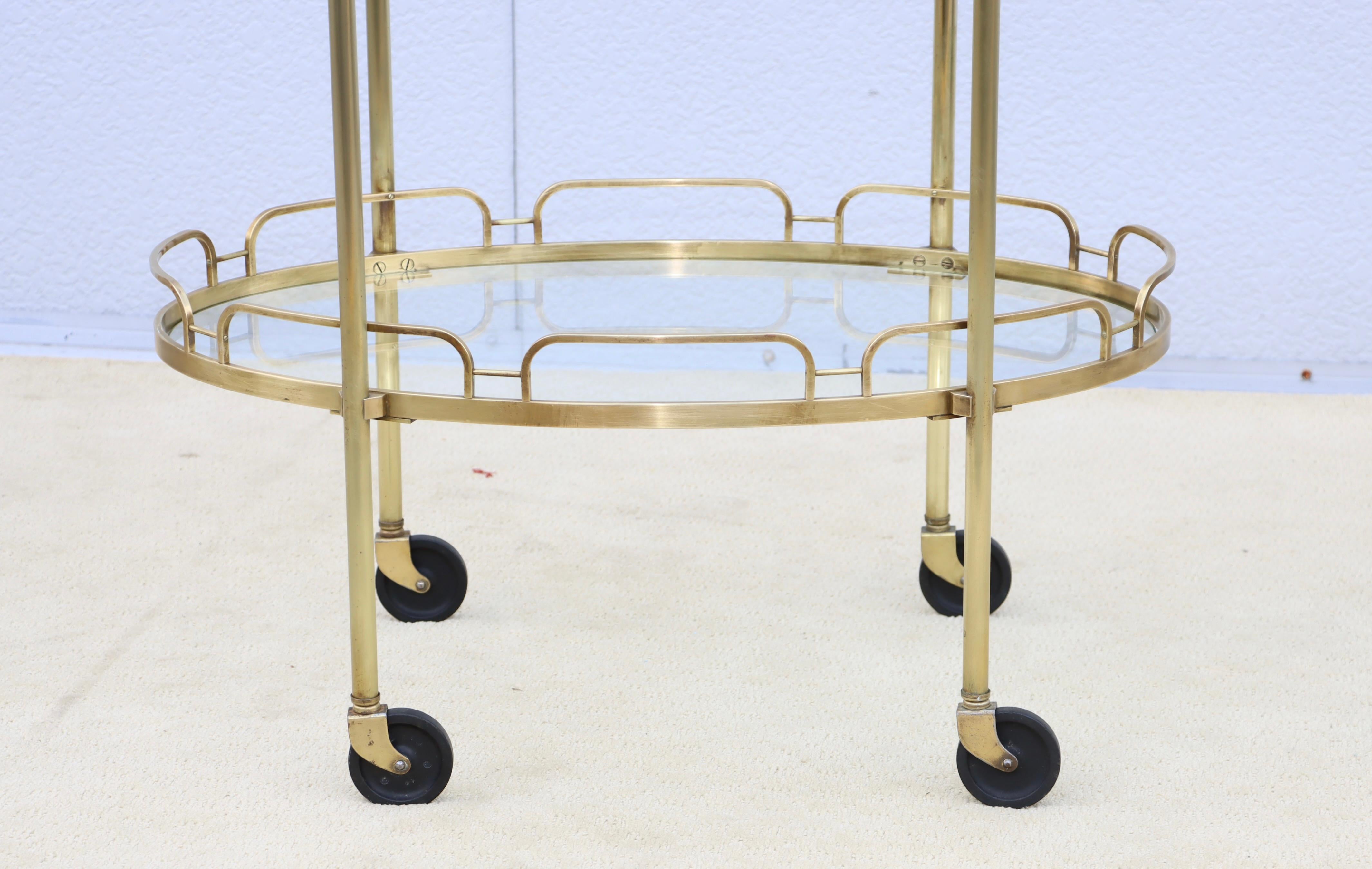 American 1950's Solid Brass Oval Bar Cart By Maxwell Phillips For Sale