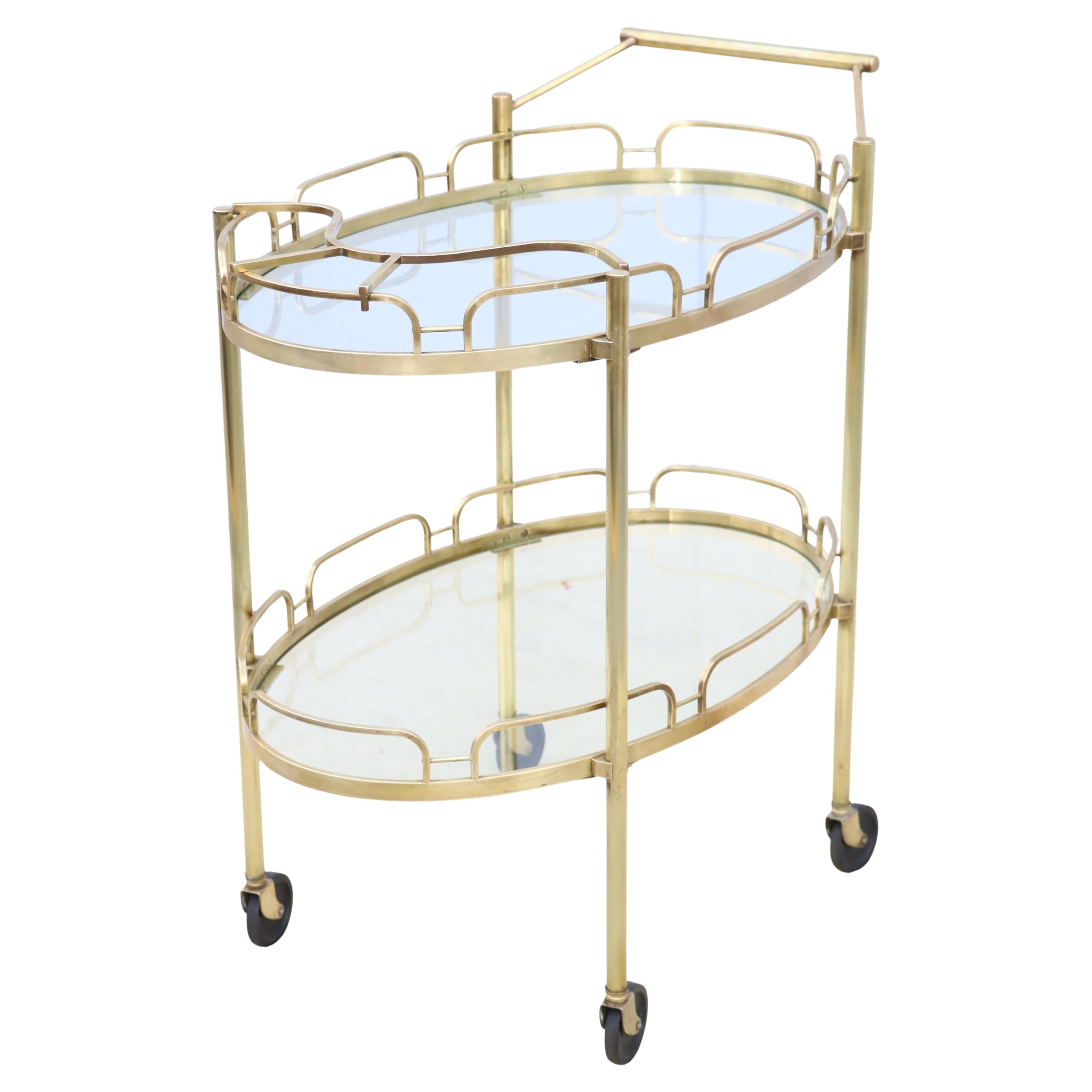 1950's Solid Brass Oval Bar Cart By Maxwell Phillips For Sale