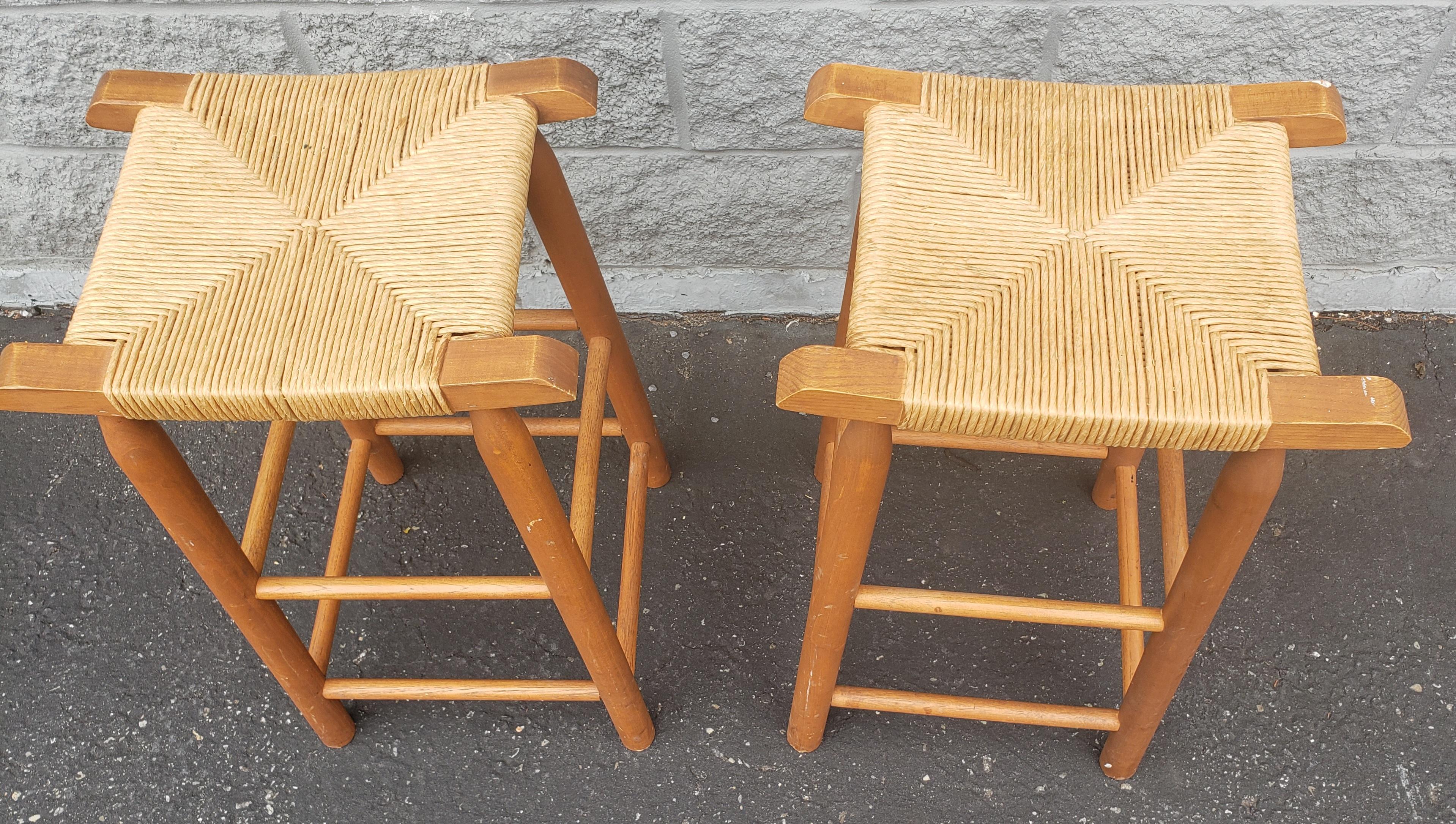 A pair of Vintage solid maple counter stools / bar stools with rush seats.
Rush seats are in very good condition. Stools are very sturdy.
Measurements are 16.5