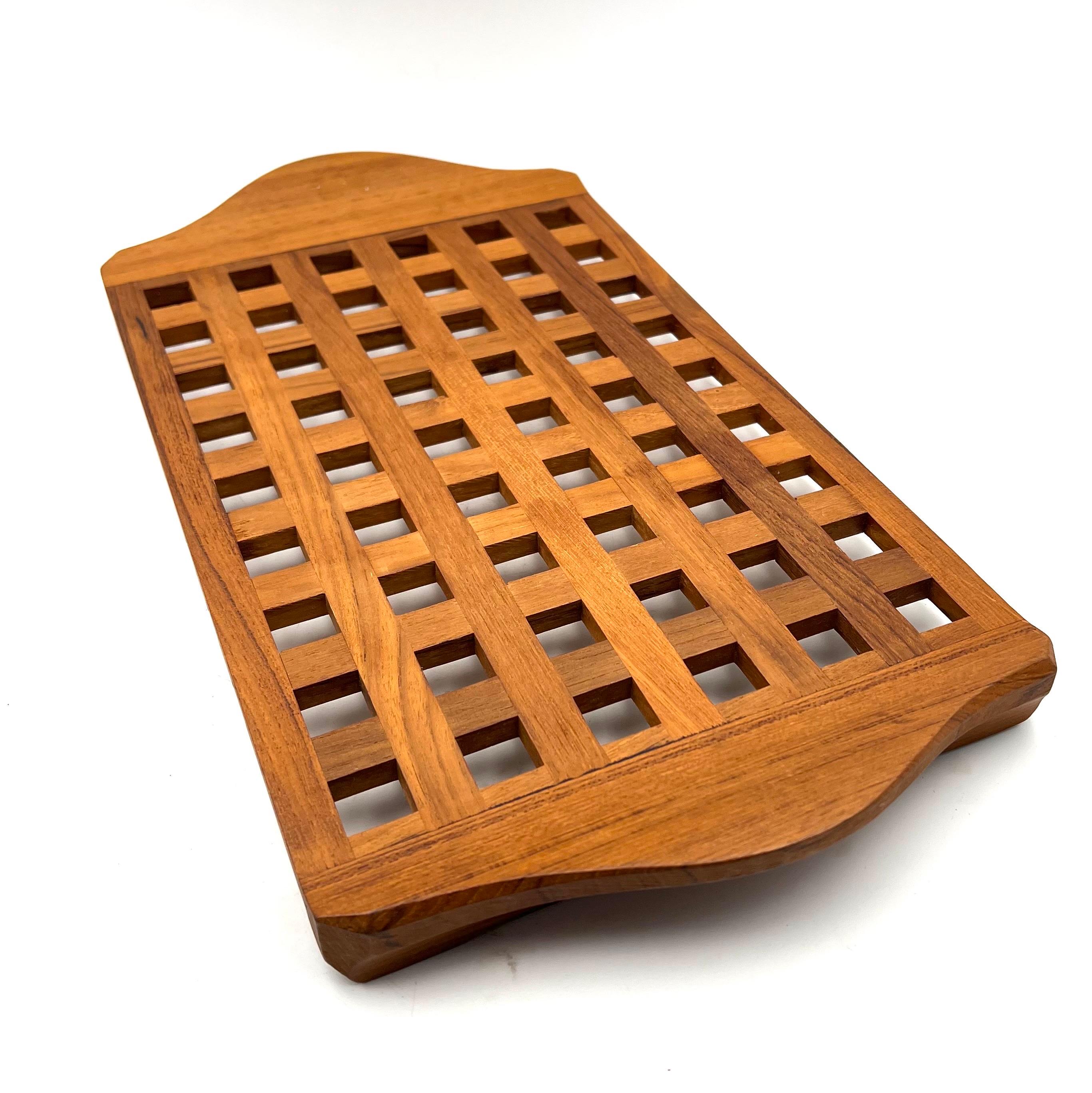 Beautiful design on this large solid teak, a tray designed by Quistgaard for Dansk, circa the 1950s, great condition with raised edges, incredible craftsmanship. early stamp at the bottom.