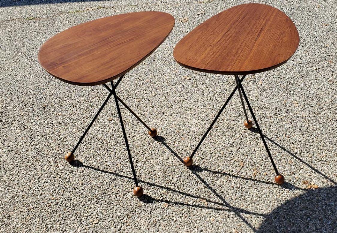 1950s Solid Walnut Side Tables, Black Tripod Rod Iron Legs With Walnut Ball Feet. The Tripod Legs Or Bases Have A Black Powder Coating. The Solid Walnut Tops Are In Excellent Vintage Condition With A Slight Sign Of Use. There Are No Nicks Or Chips