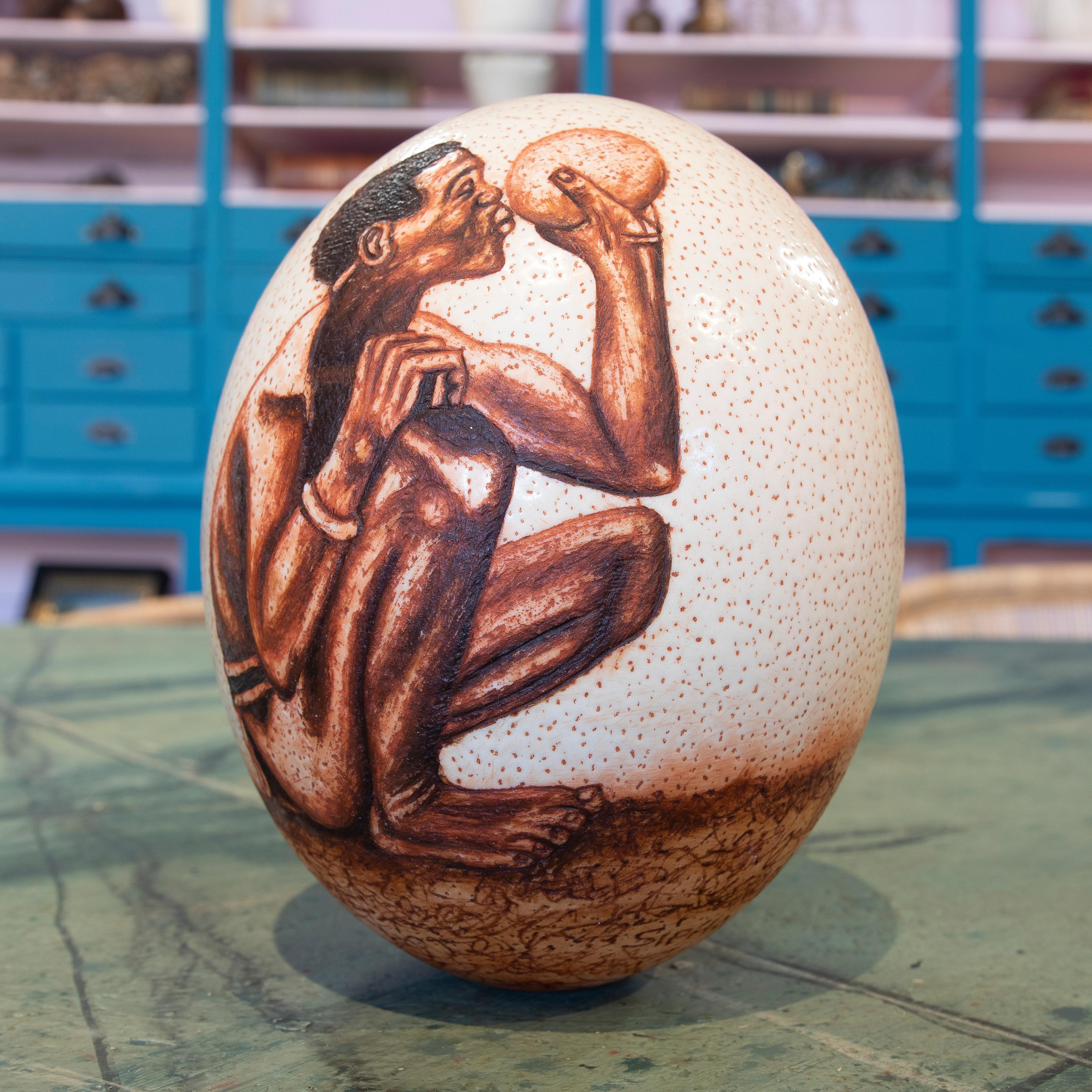 Original 1950s South African scrimshaw ostrich egg by late chief Sipho Ndlvu.